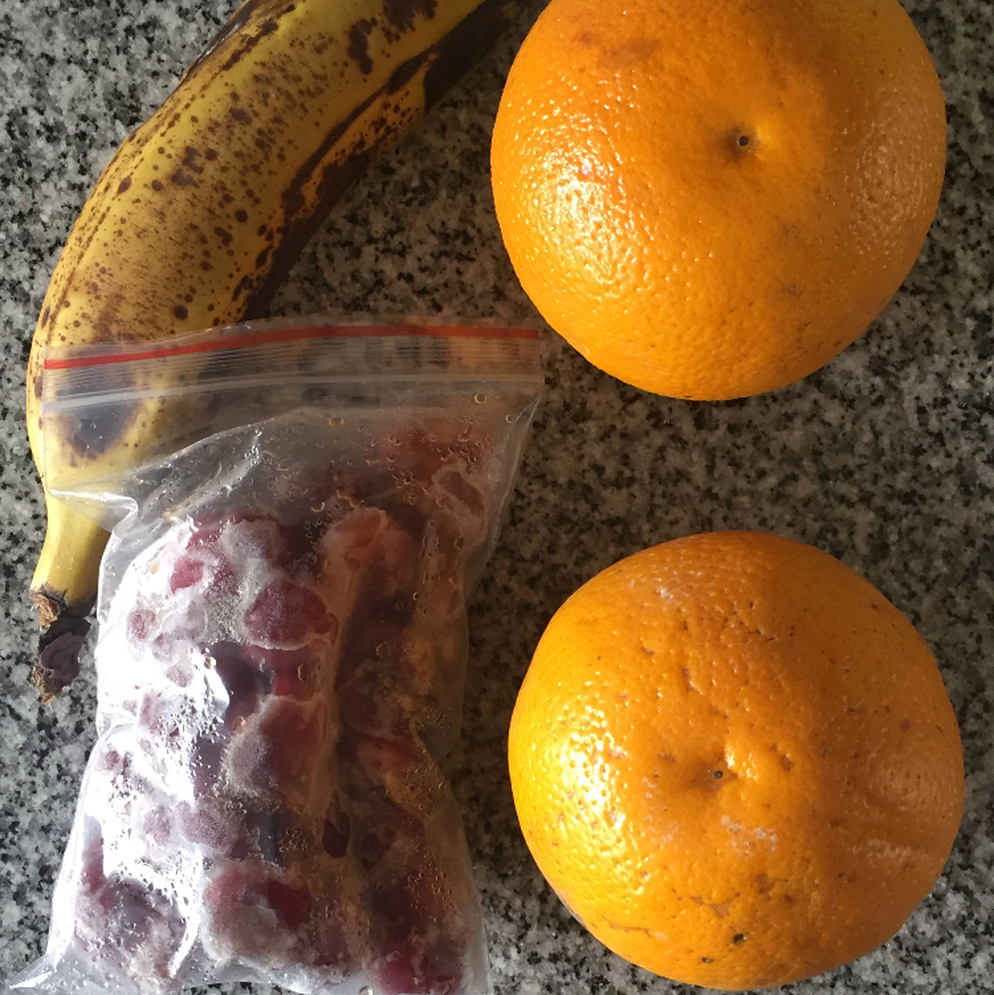 gather all ingredients. Wash and peel banana, core cherries and squeeze orange.