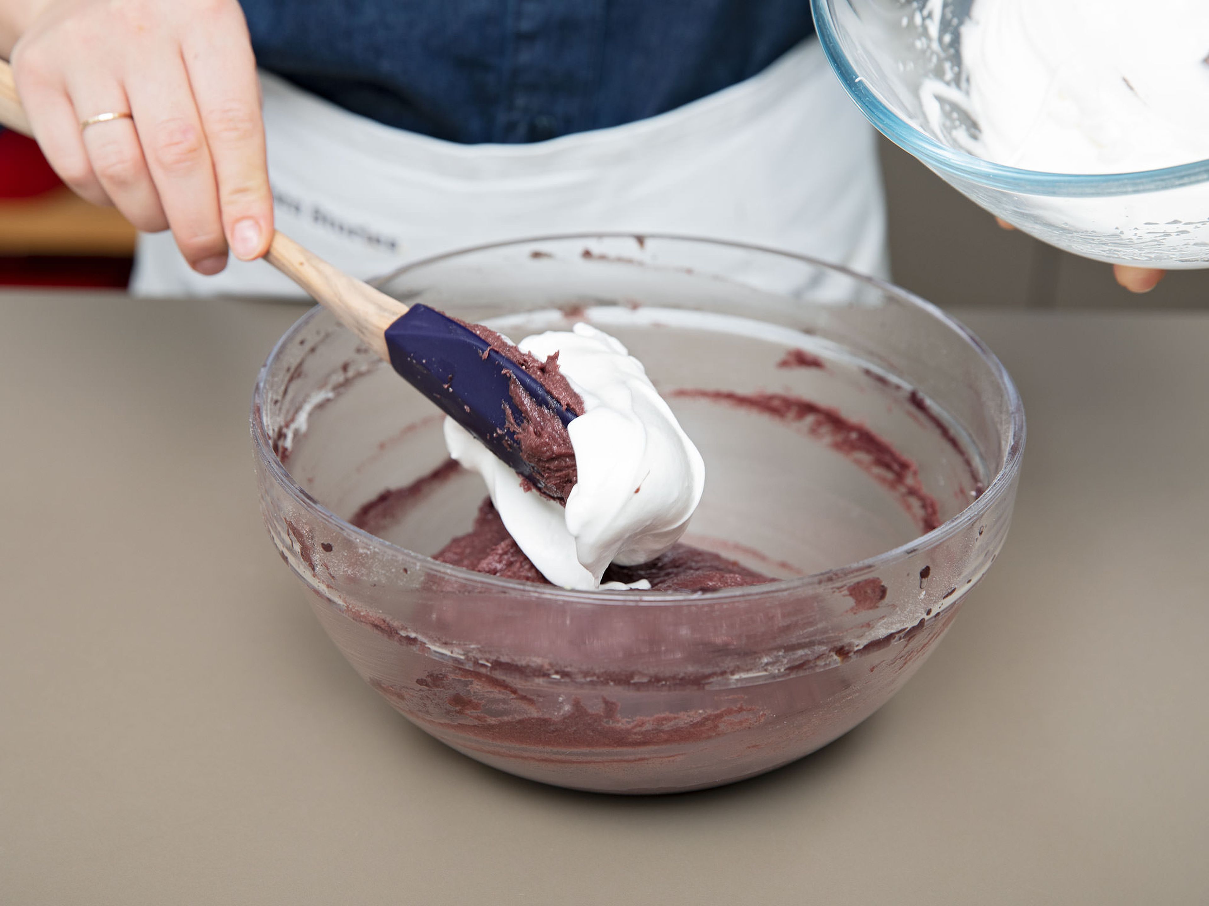 In a separate bowl, beat egg whites until stiff and fluffy, and fold into batter.