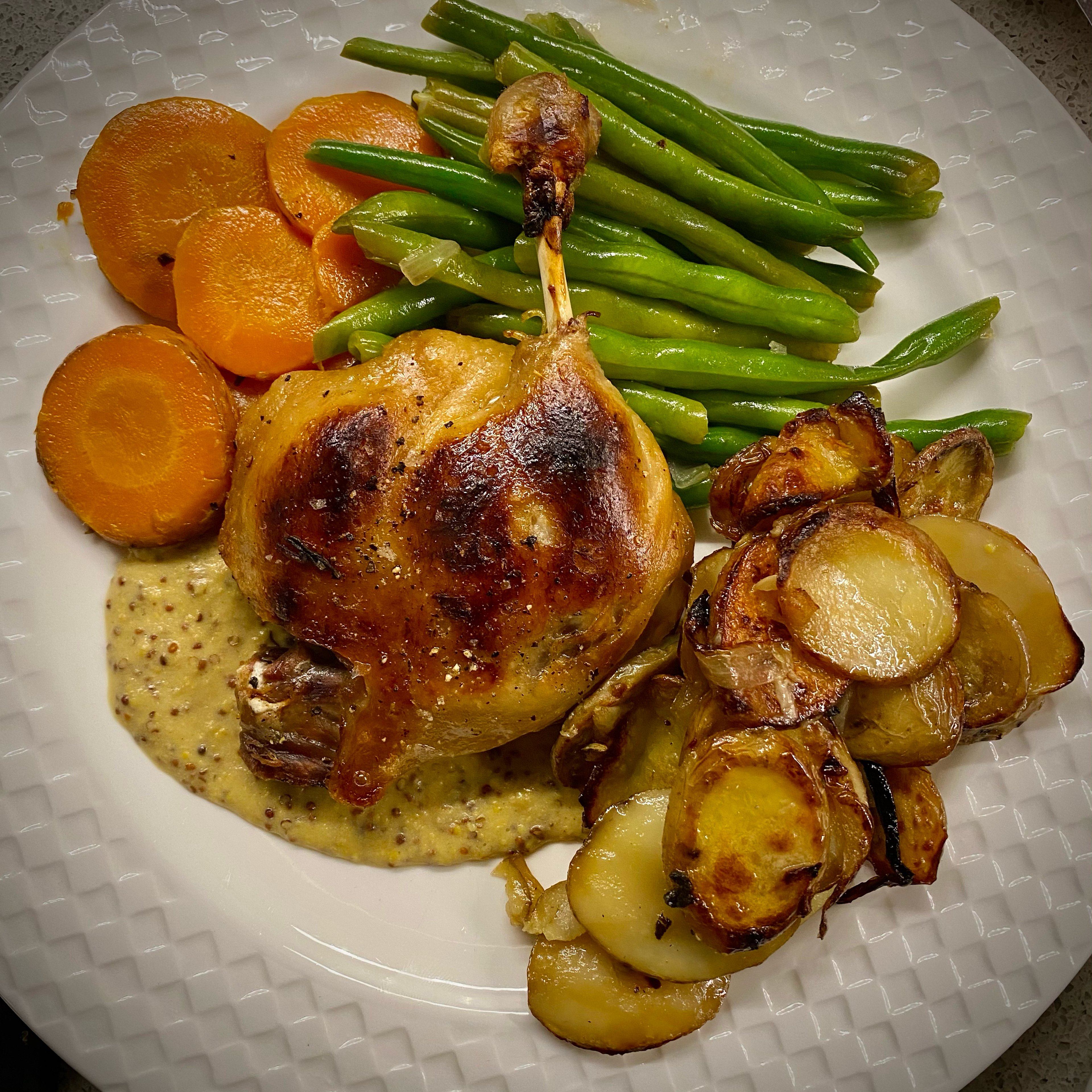 Duck Confit, Lyonnaise Potatoes and Duck Fat Carrots