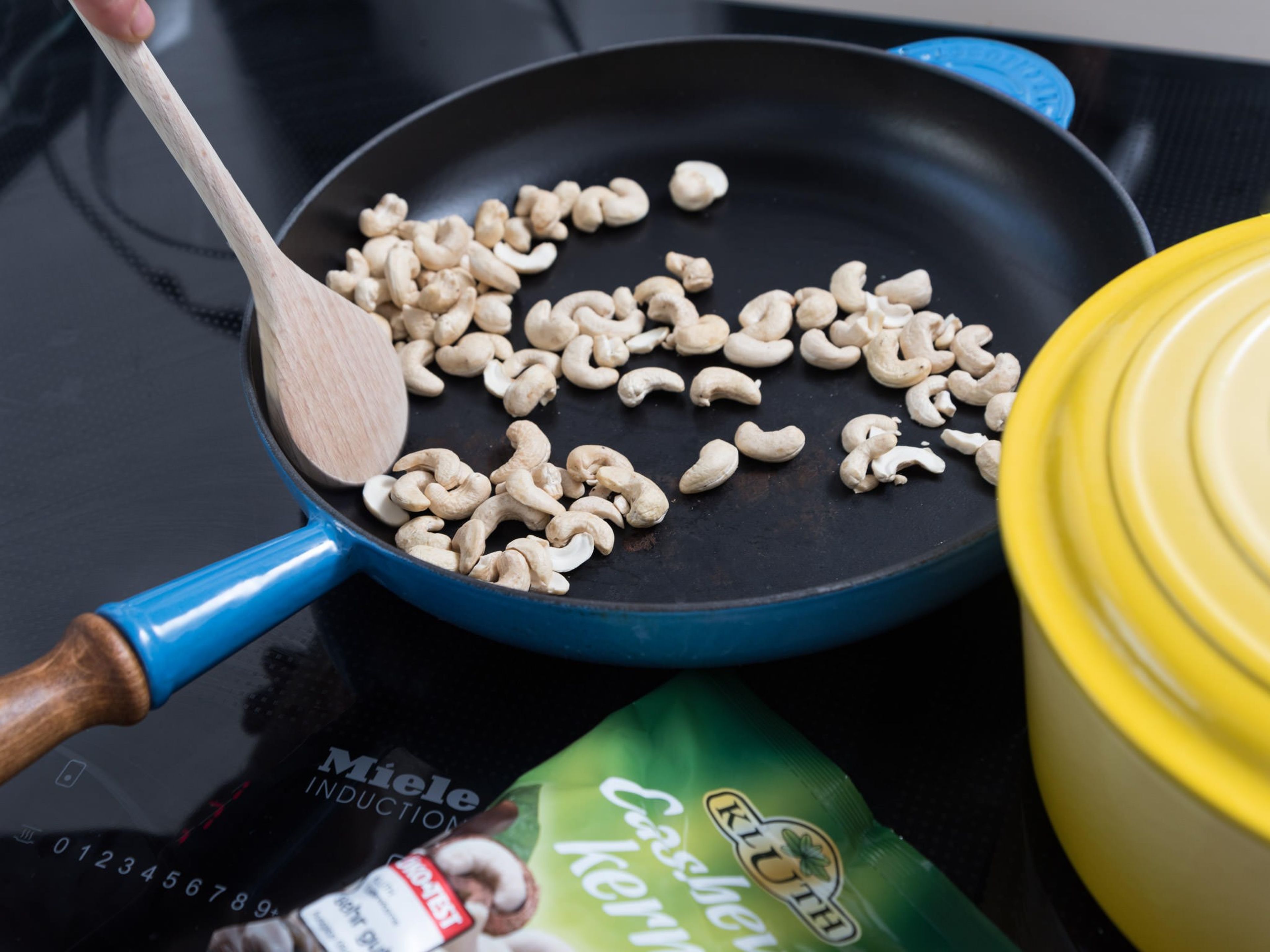 Heat a frying pan over medium heat. Transfer cashews into frying pan and toast for approx. 2 – 3 min., or until browned. Remove from pan and set aside.