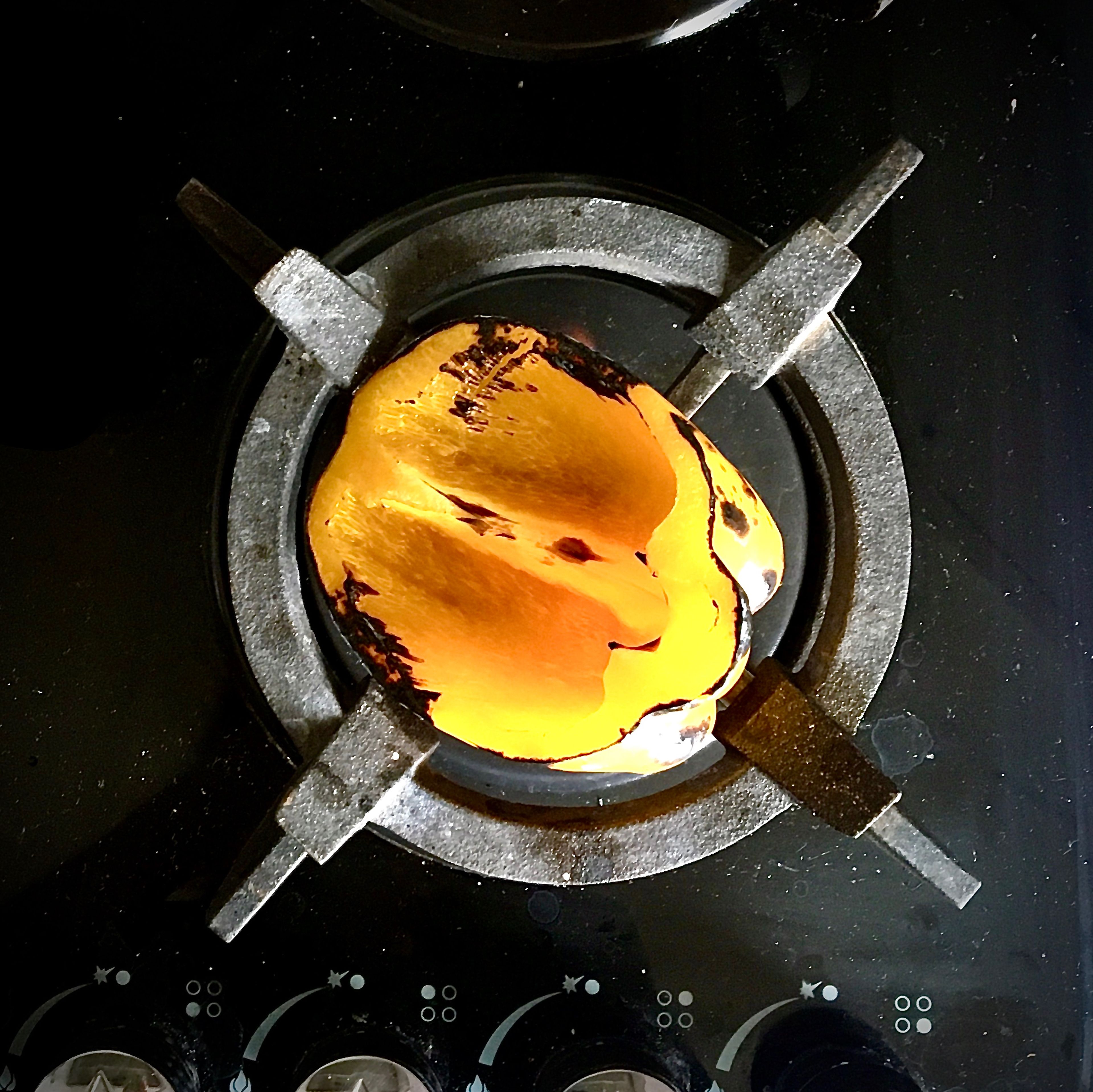 Put the un-julienned part of yellow bell pepper over the flames of your hob gas and roast until tender and pleasantly smoky. Transfer to a small bowl to cool. Cover with a lid to ease the peeling process.