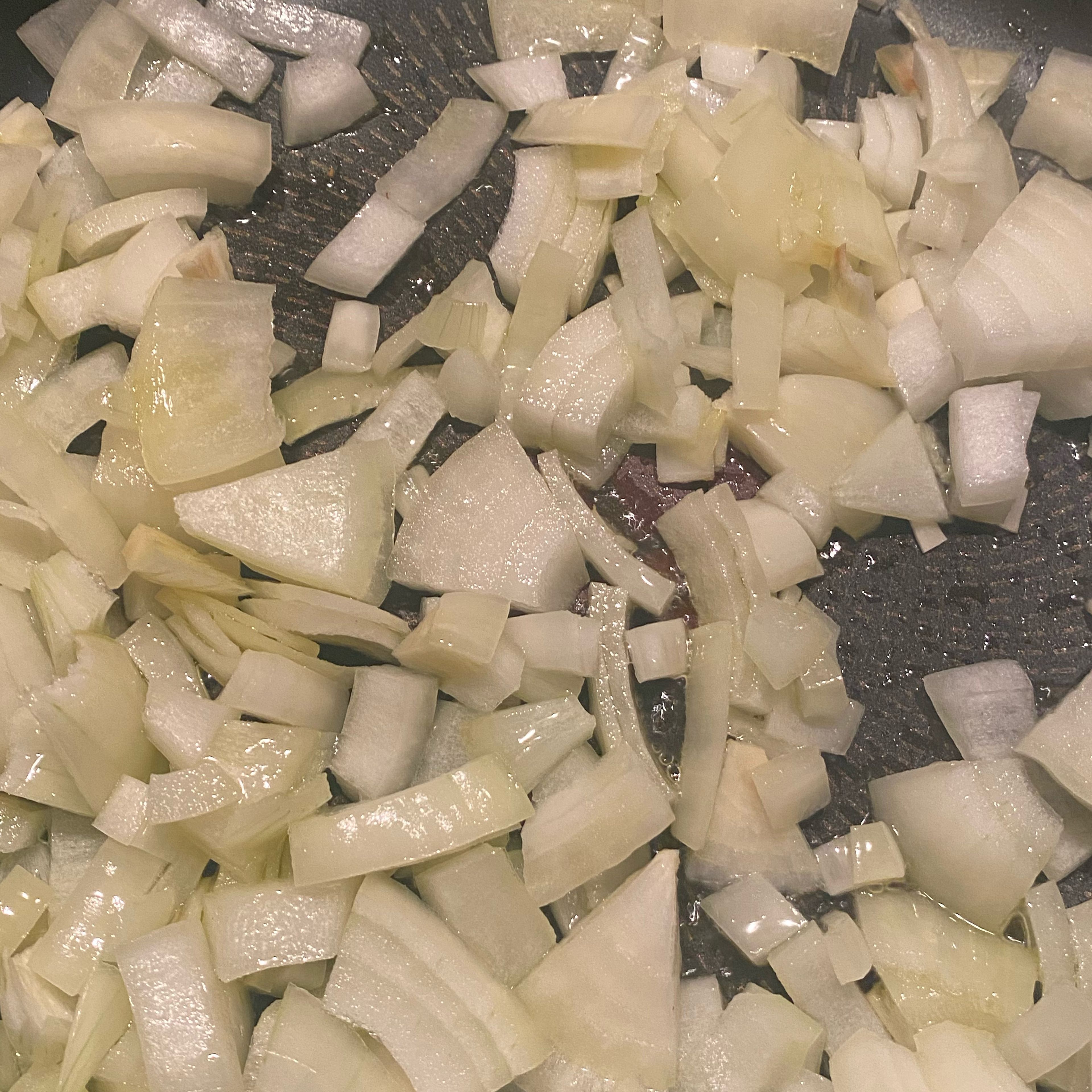 Heat the olive oil in a high-sided pan and sauté the onion