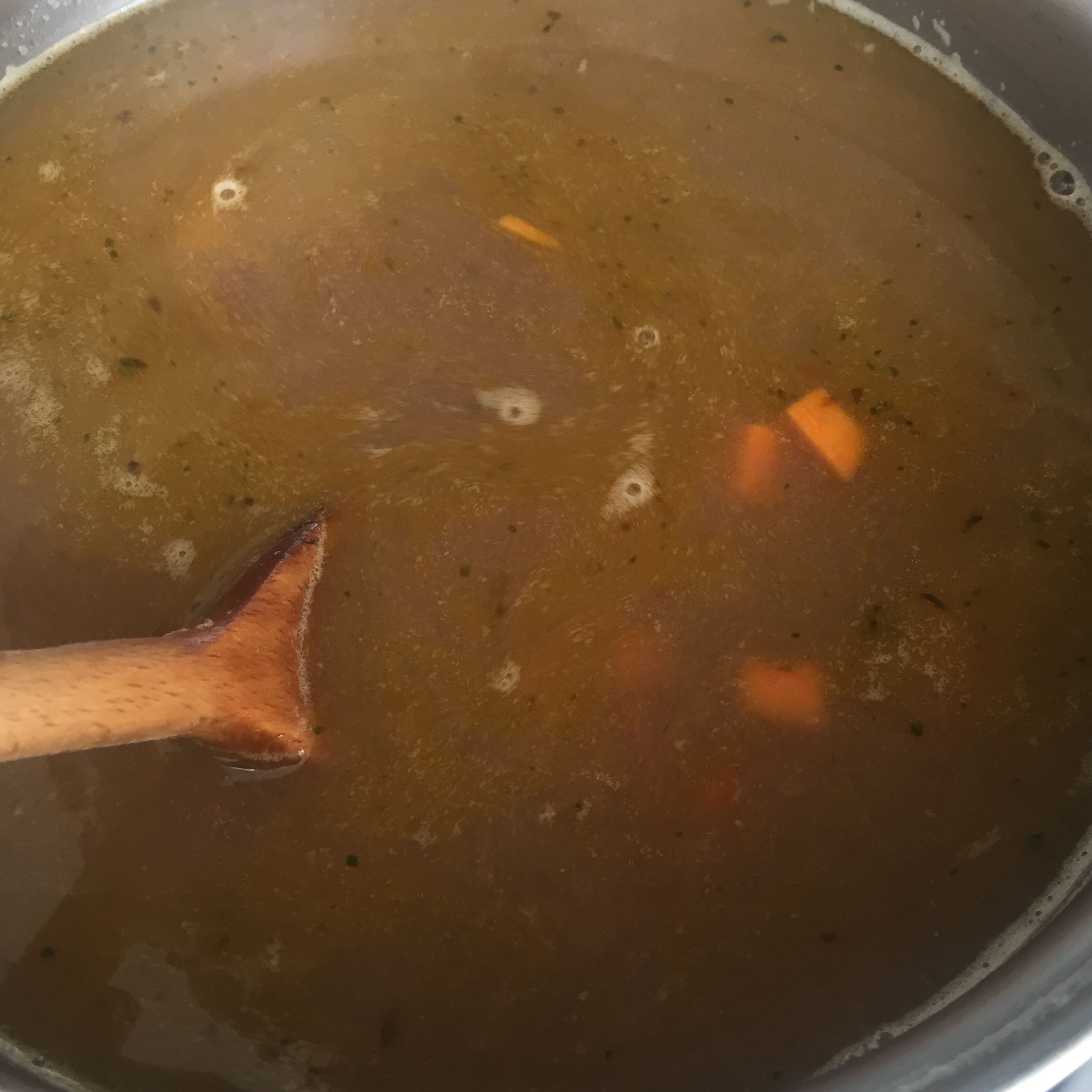 Add beef stock and water to simmering taco sauce. If a thicker sauce is desired, reduce the amount of water. Season to taste.