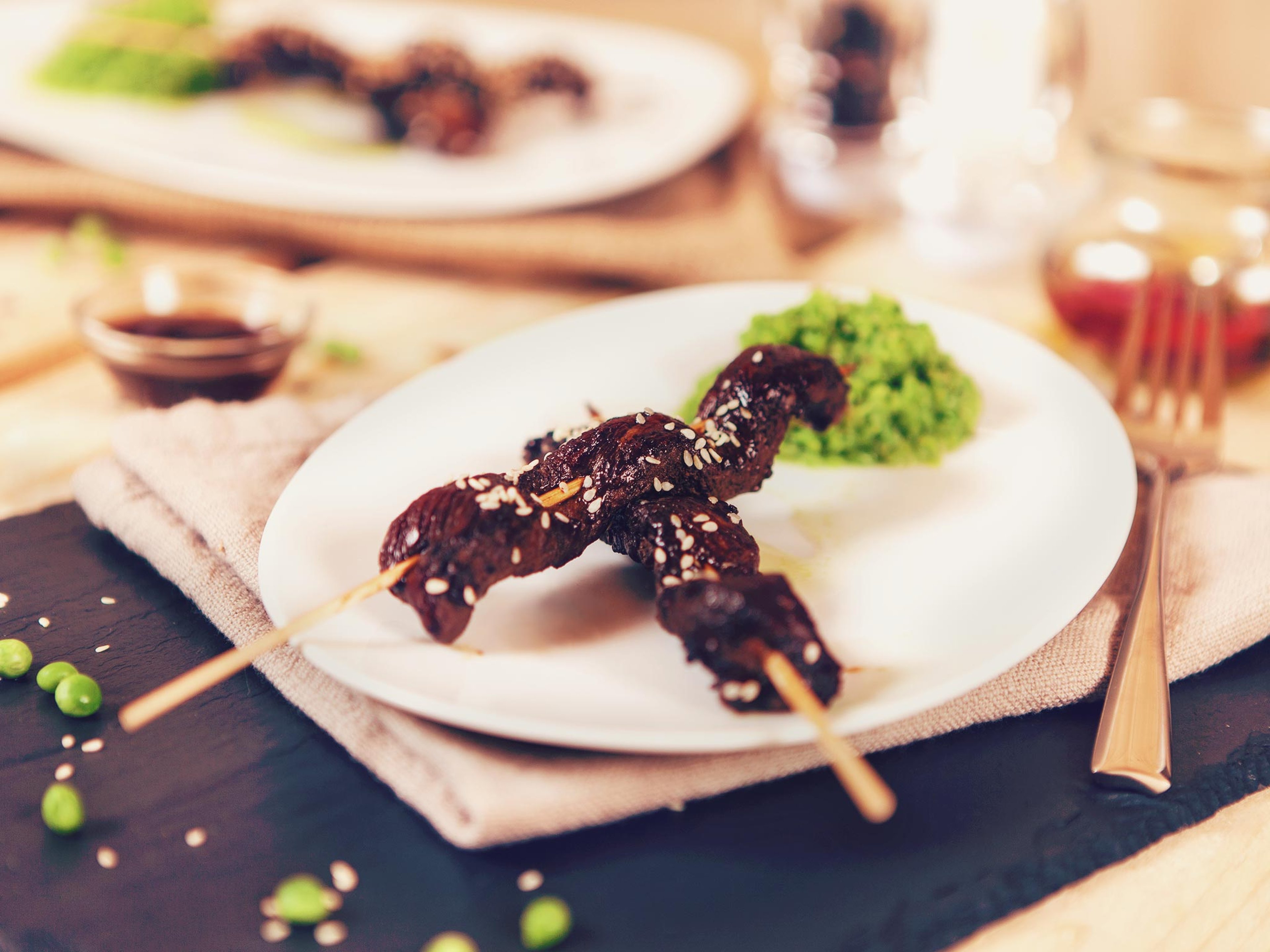 Teriyaki lamb skewers with pea-mint-puree