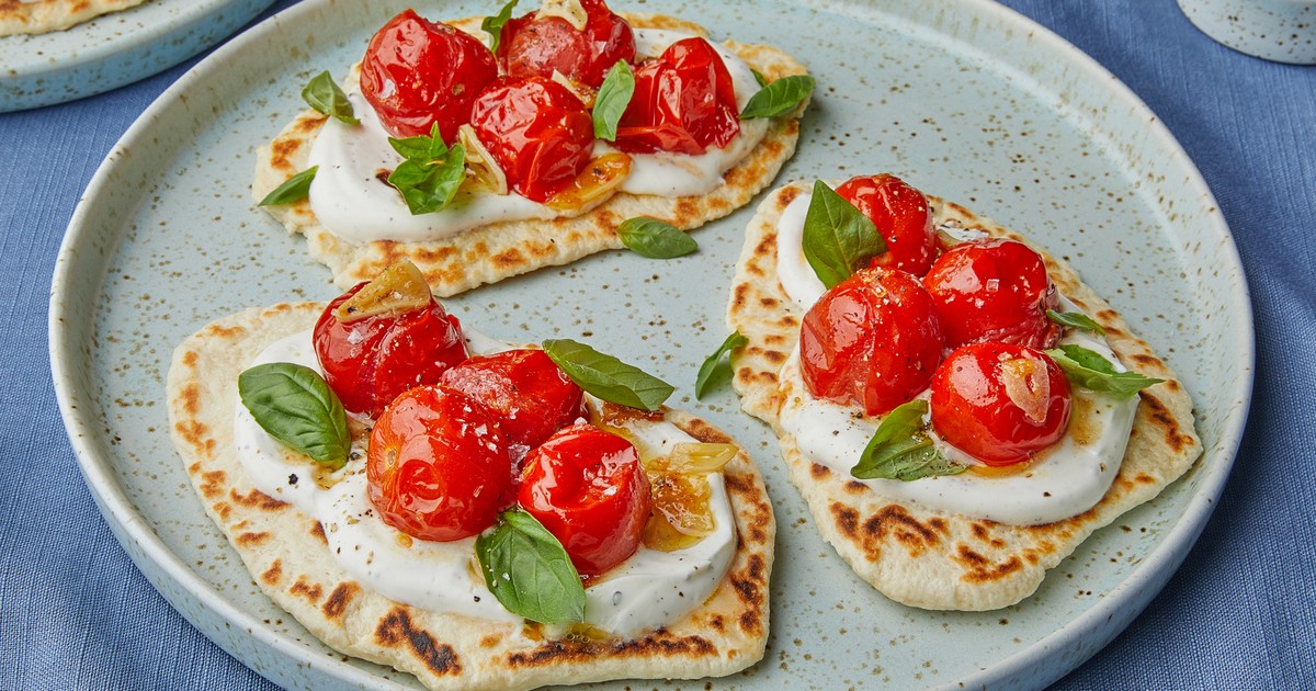 Easy homemade flatbreads with burst cherry tomatoes Recipe Kitchen Stories