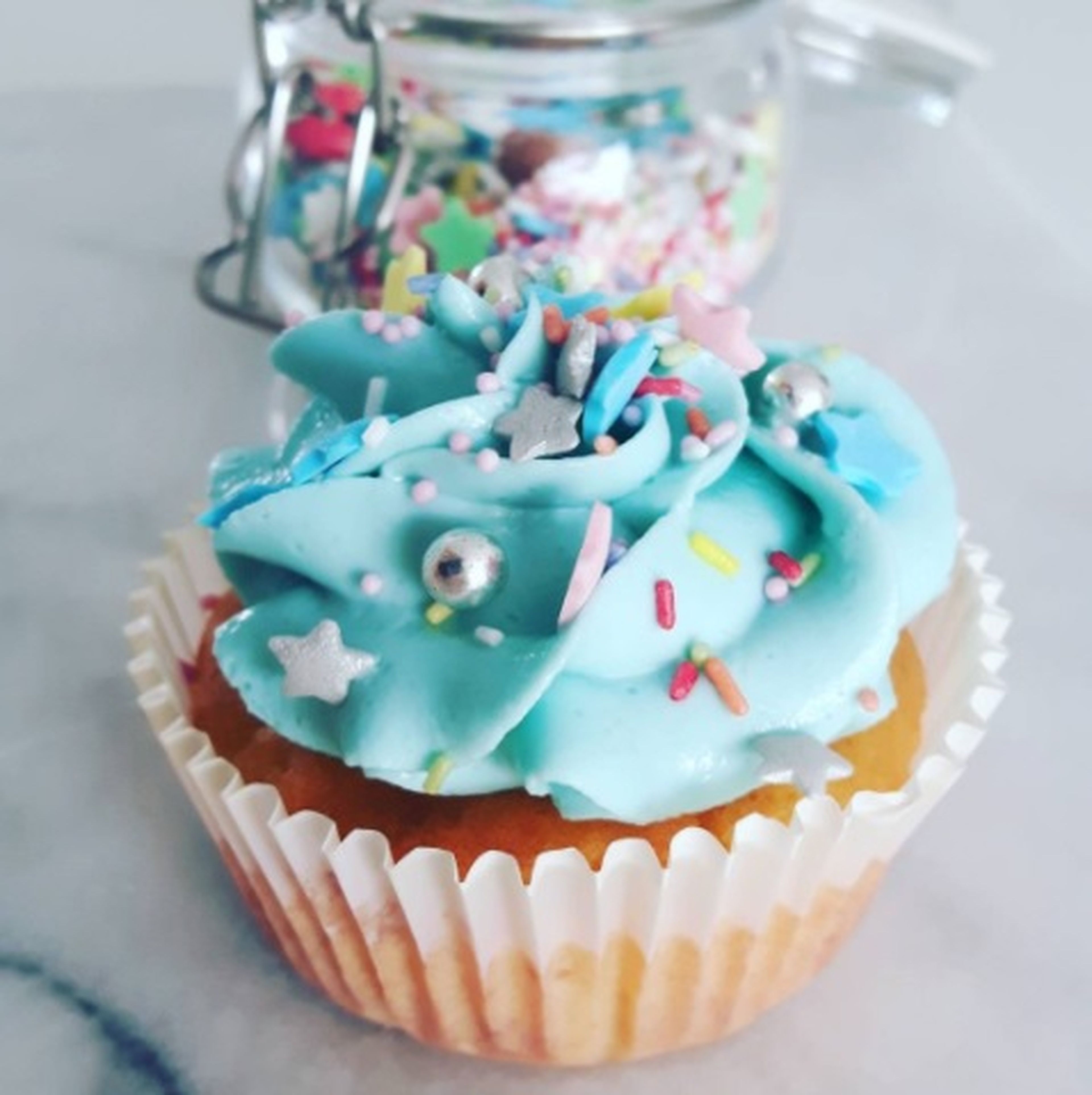 Vanilla cupcake with sprinkles