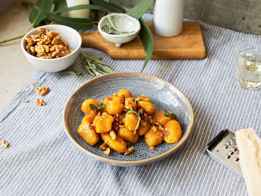 Pumpkin gnocchi with sage butter, walnuts, and smoked bacon