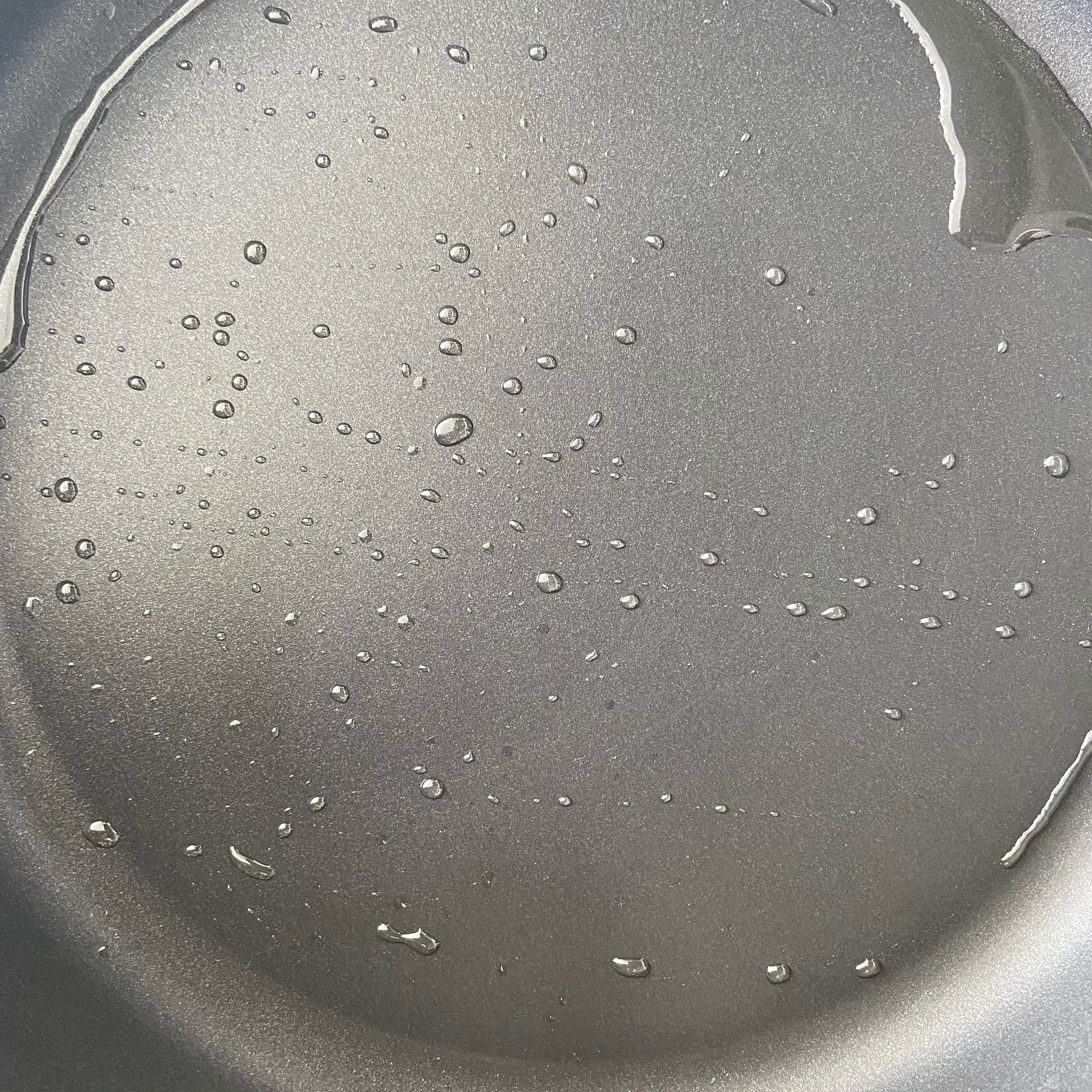 Heat oil in a pan.