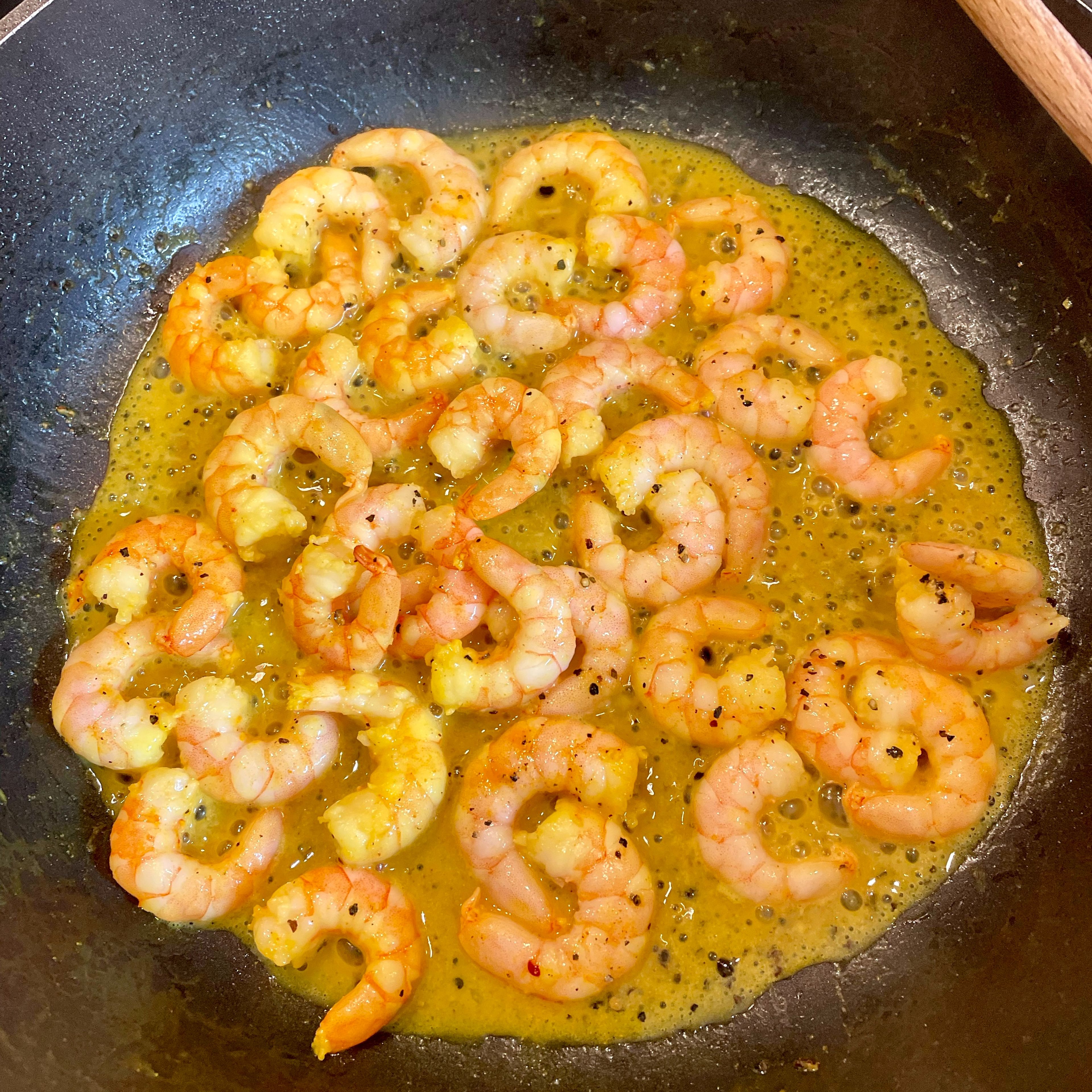 Heat oil in the pan and fry prawns till changing color. Remove prawns from pan and set aside.