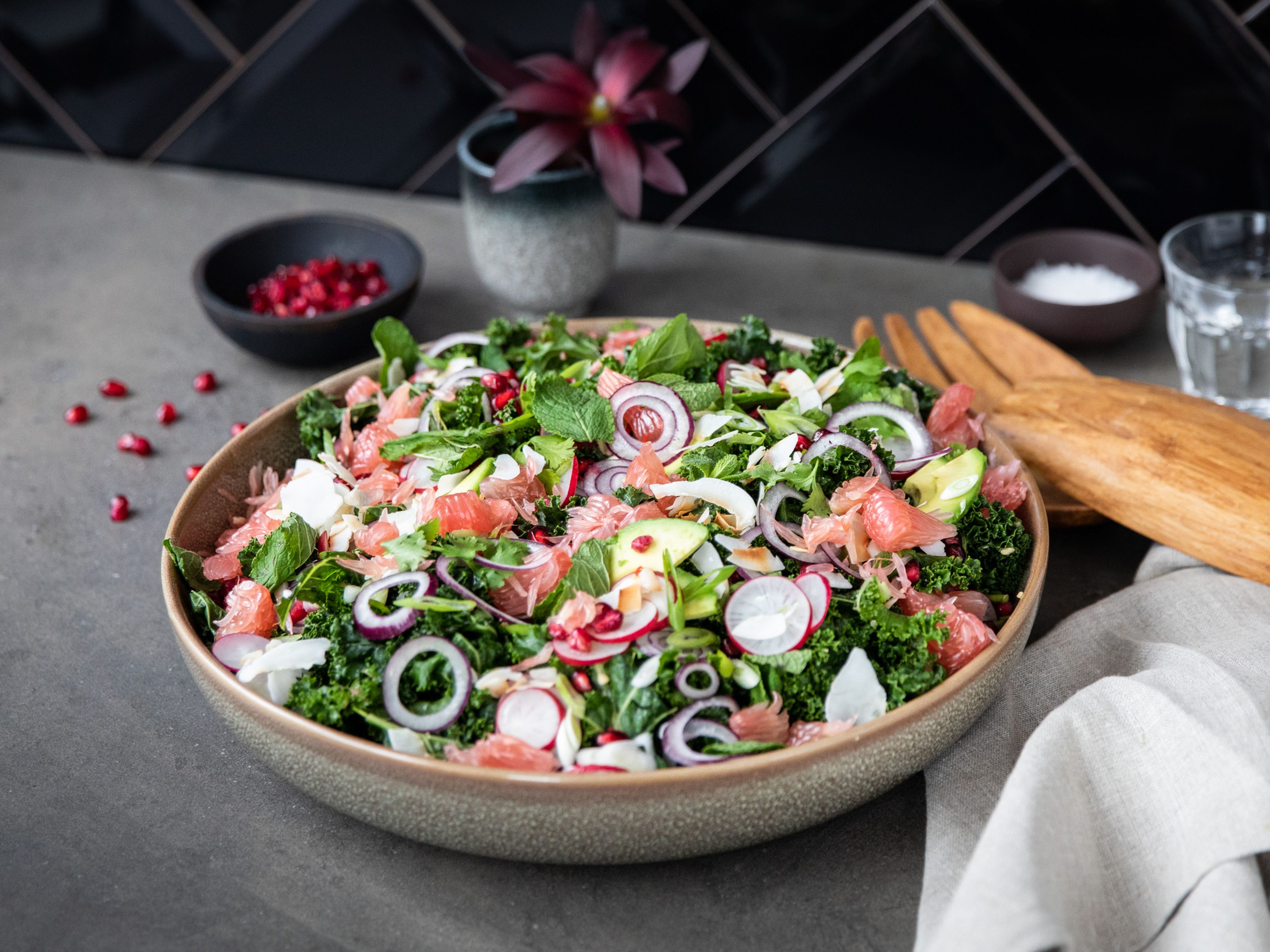 Pink pomelo salad with kale and avocado