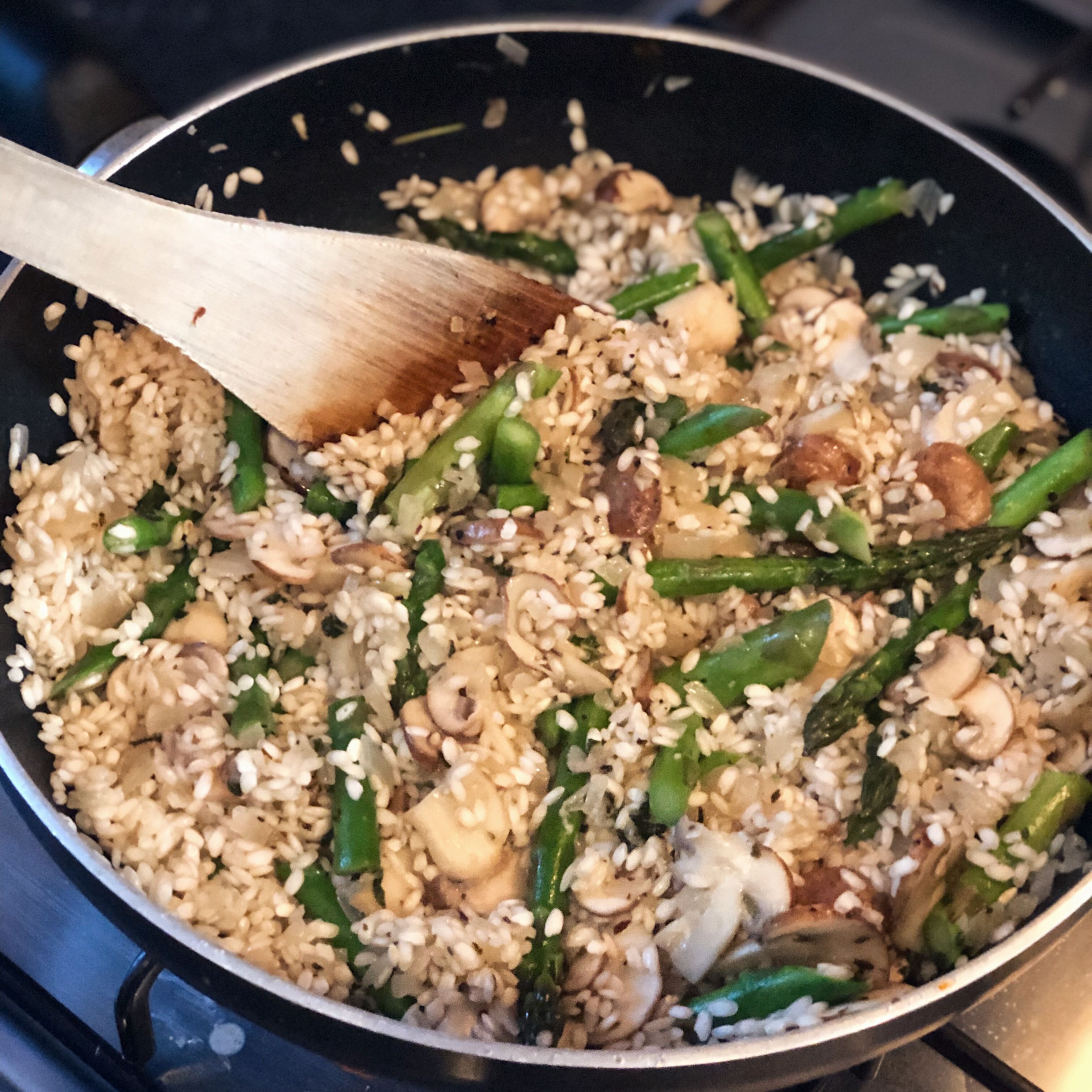 Add rice to wok and fry for 3 minutes on medium heat.