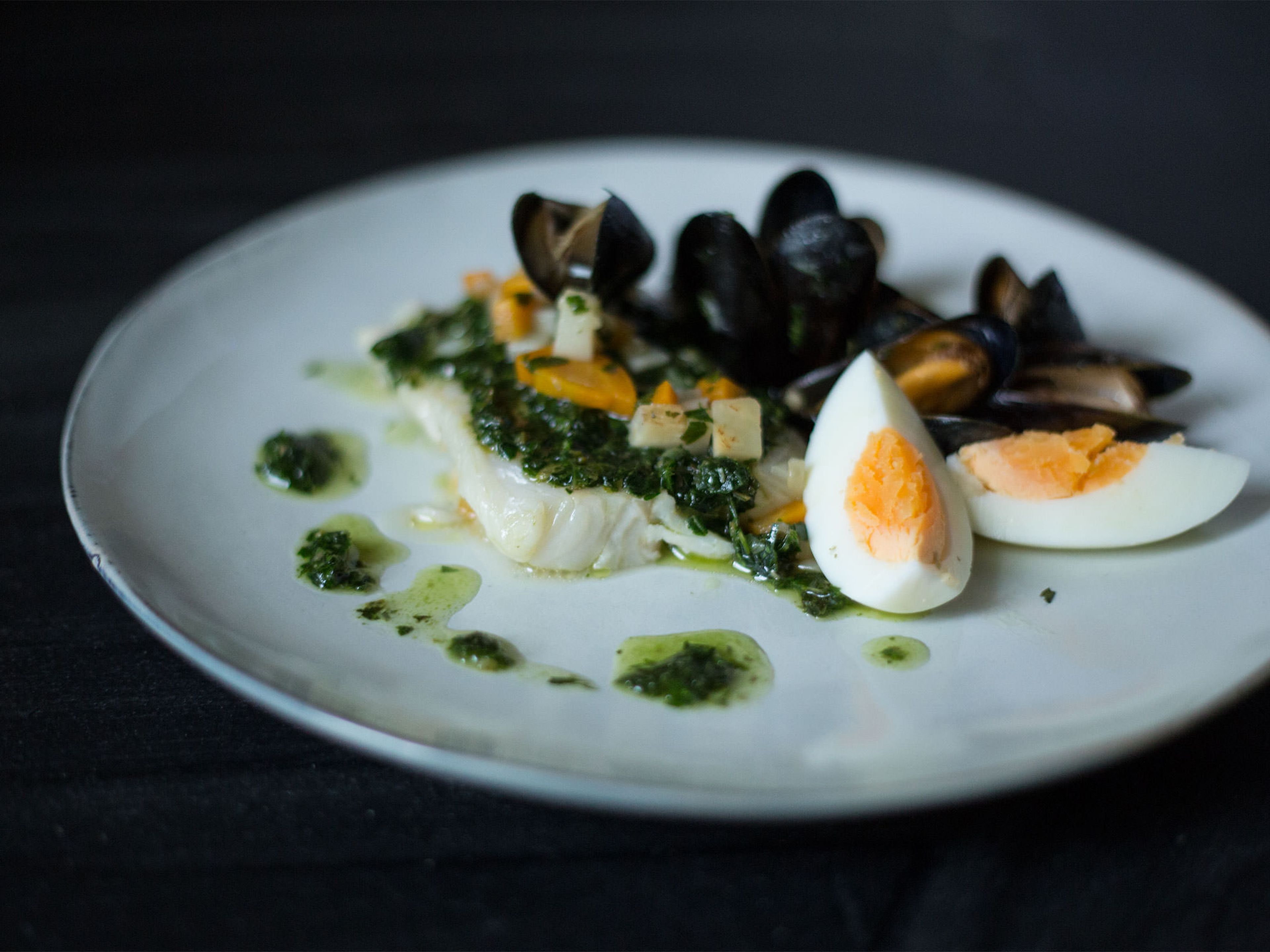 Shortly before the hake is cooked, add the mussels to the pan to warm before serving. To serve, pour over the salsa verde, quarter the hard-boiled eggs and arrange around the hake. Enjoy!