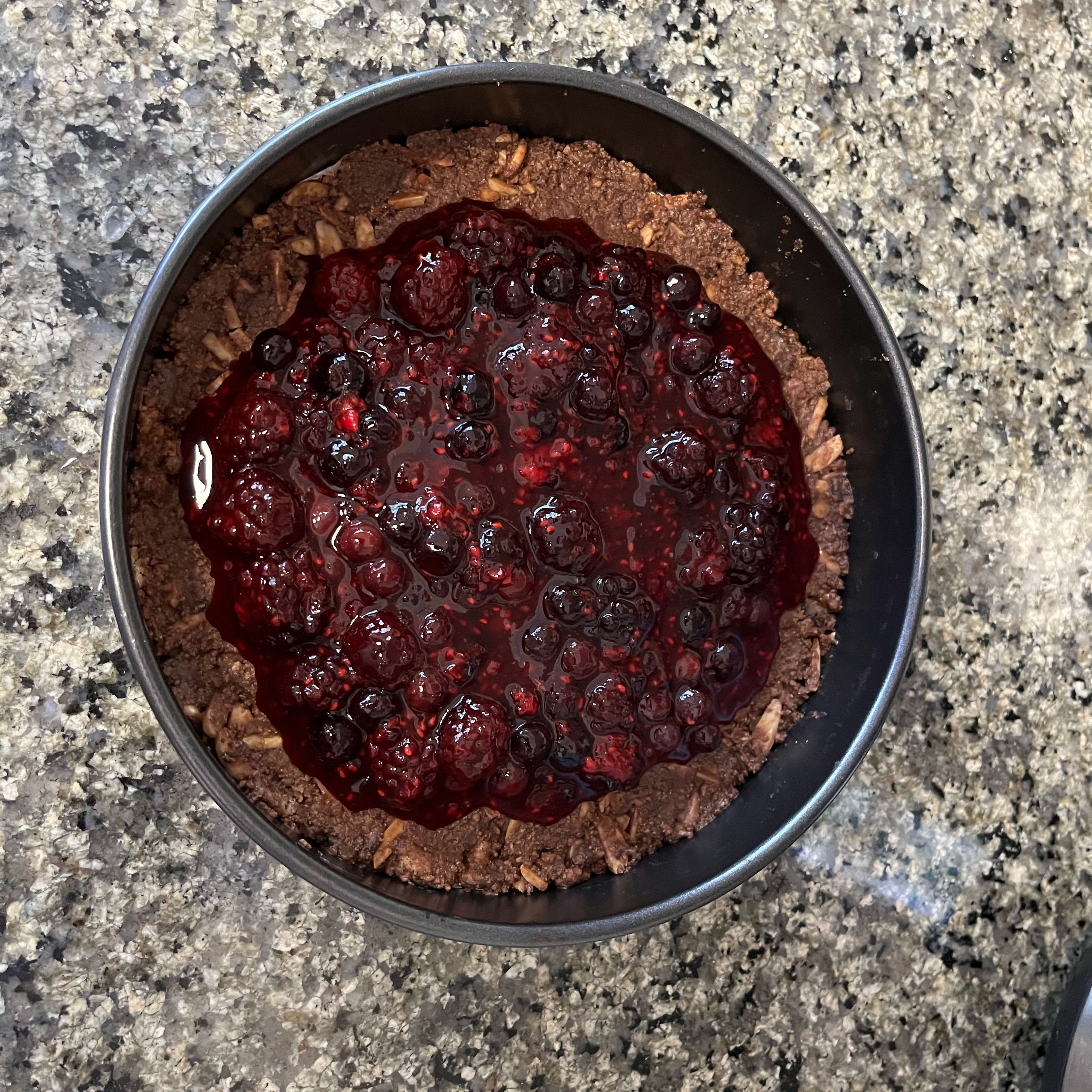 Combine sugar and starch with 25g of water. Add to the berries and bring mix to boil. Once boiling, remove from heat and leave to cool. Add the cooled and thickened berry mix on top of the cake base - leave a rim around the edge.