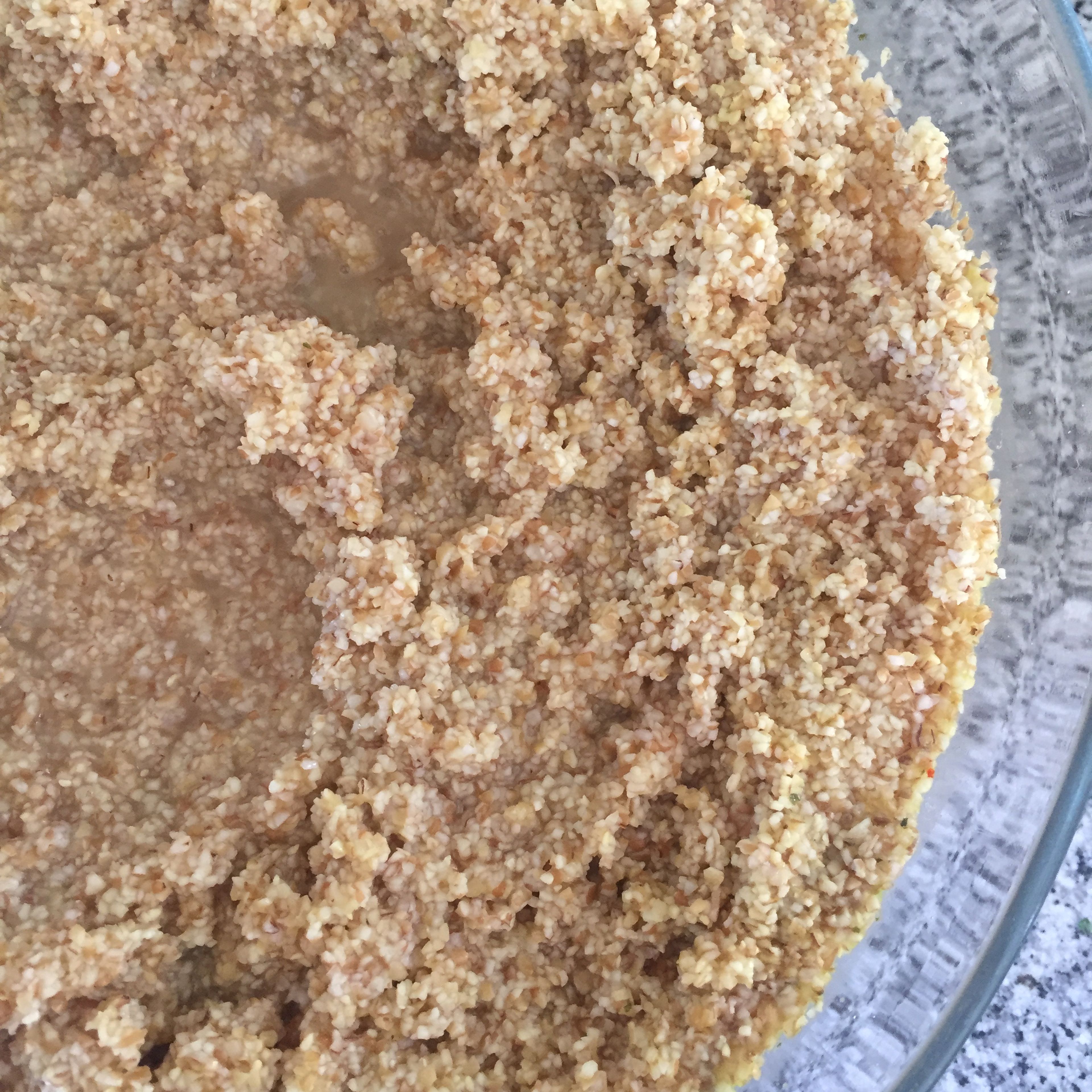 after about half an hour, the bulgur shoud look something like this. drain any excess liquid, and place in a bowl.