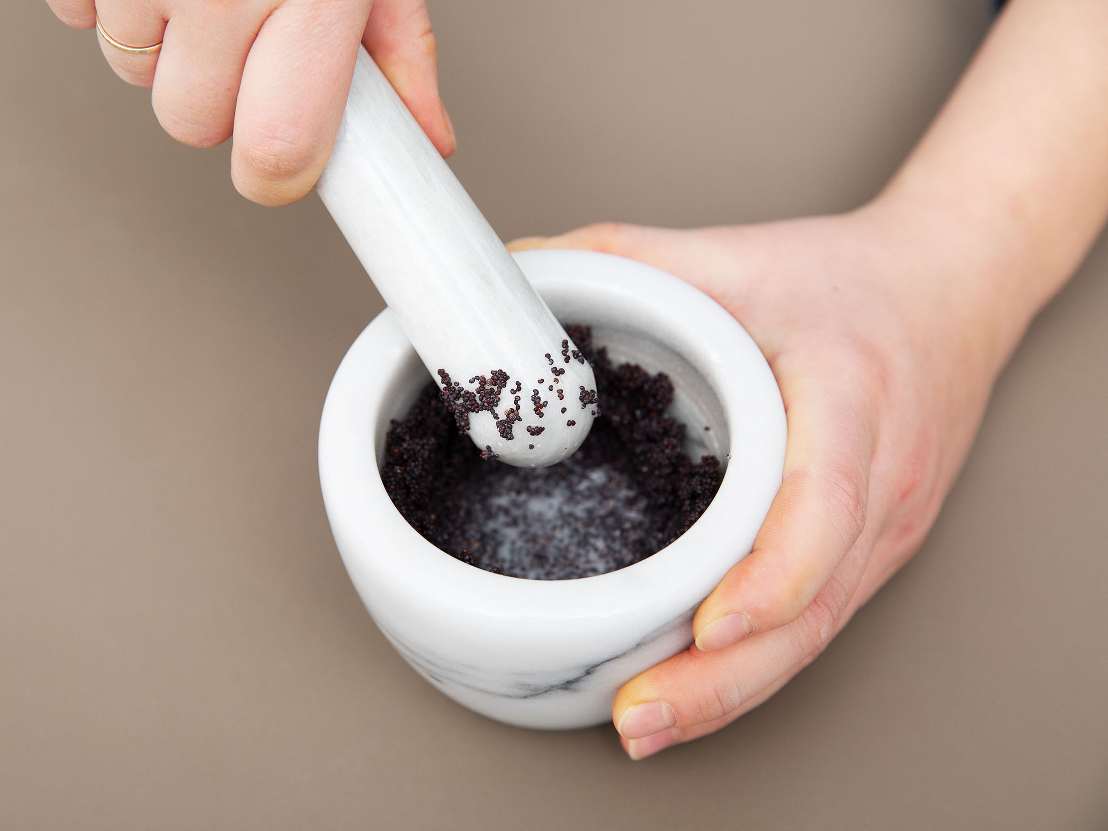 Soak the poppy seeds overnight. Make a smooth paste of the poppy seeds.