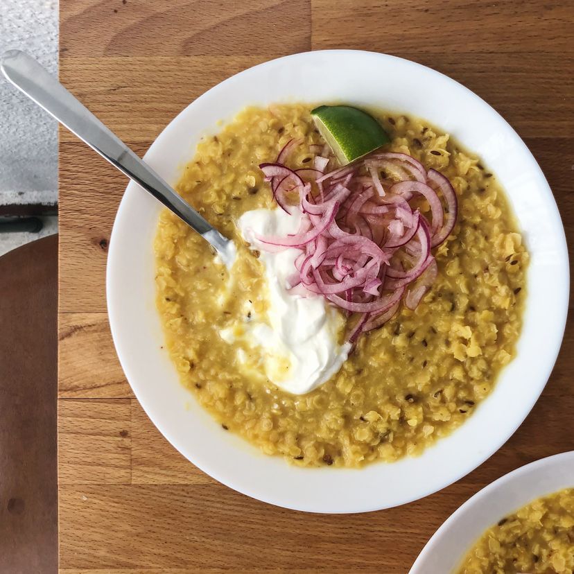 Easiest red lentil dal with yogurt and pickled onion