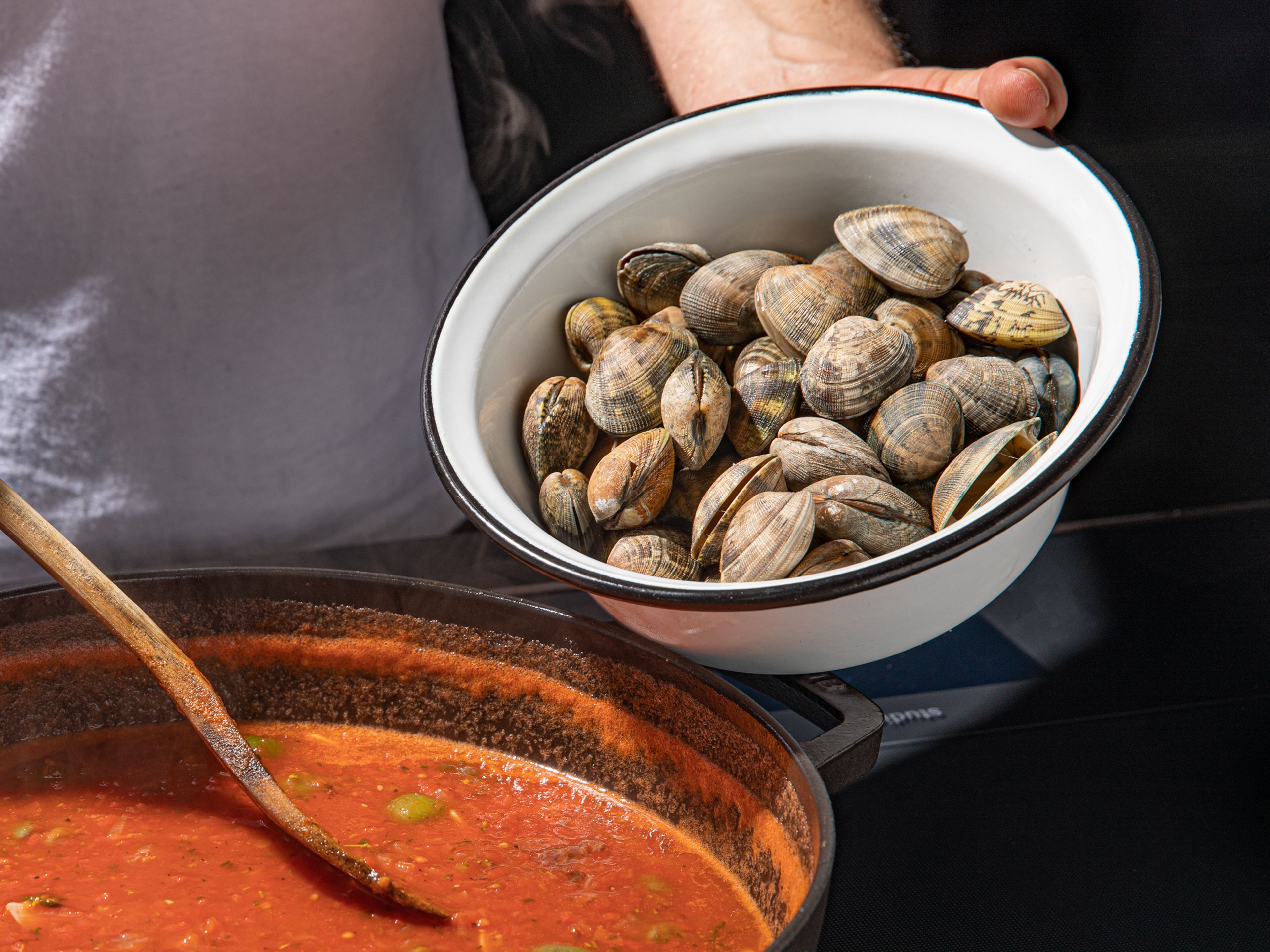Add clams to the pot, cover, and continue to simmer for approx. 8 min. more. Add the octopus, swordfish, and chopped parsley to the sauce and cook for another 2 min. Serve with ciabatta. Enjoy!