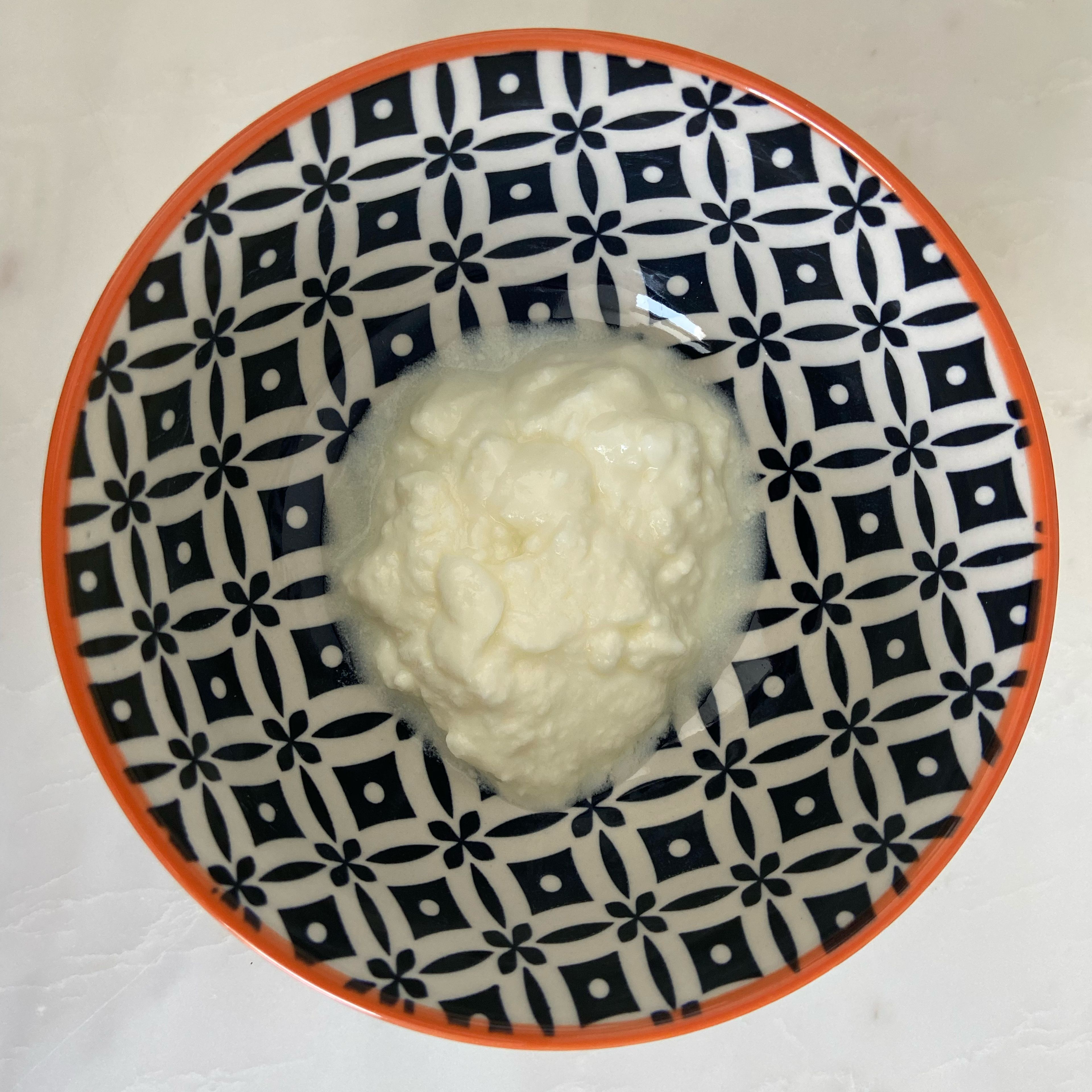 In a mixing bowl, put yogurt