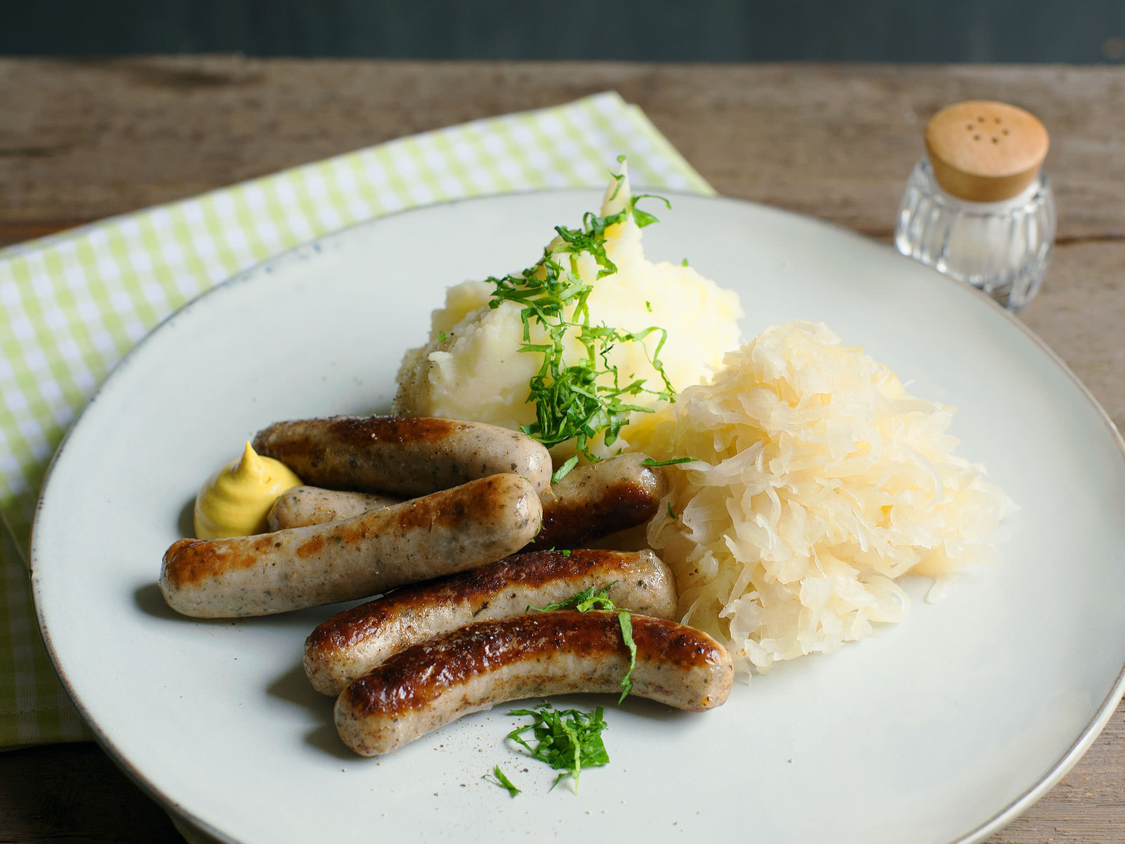 Nürnberger bratwursts with sauerkraut and mashed potatoes