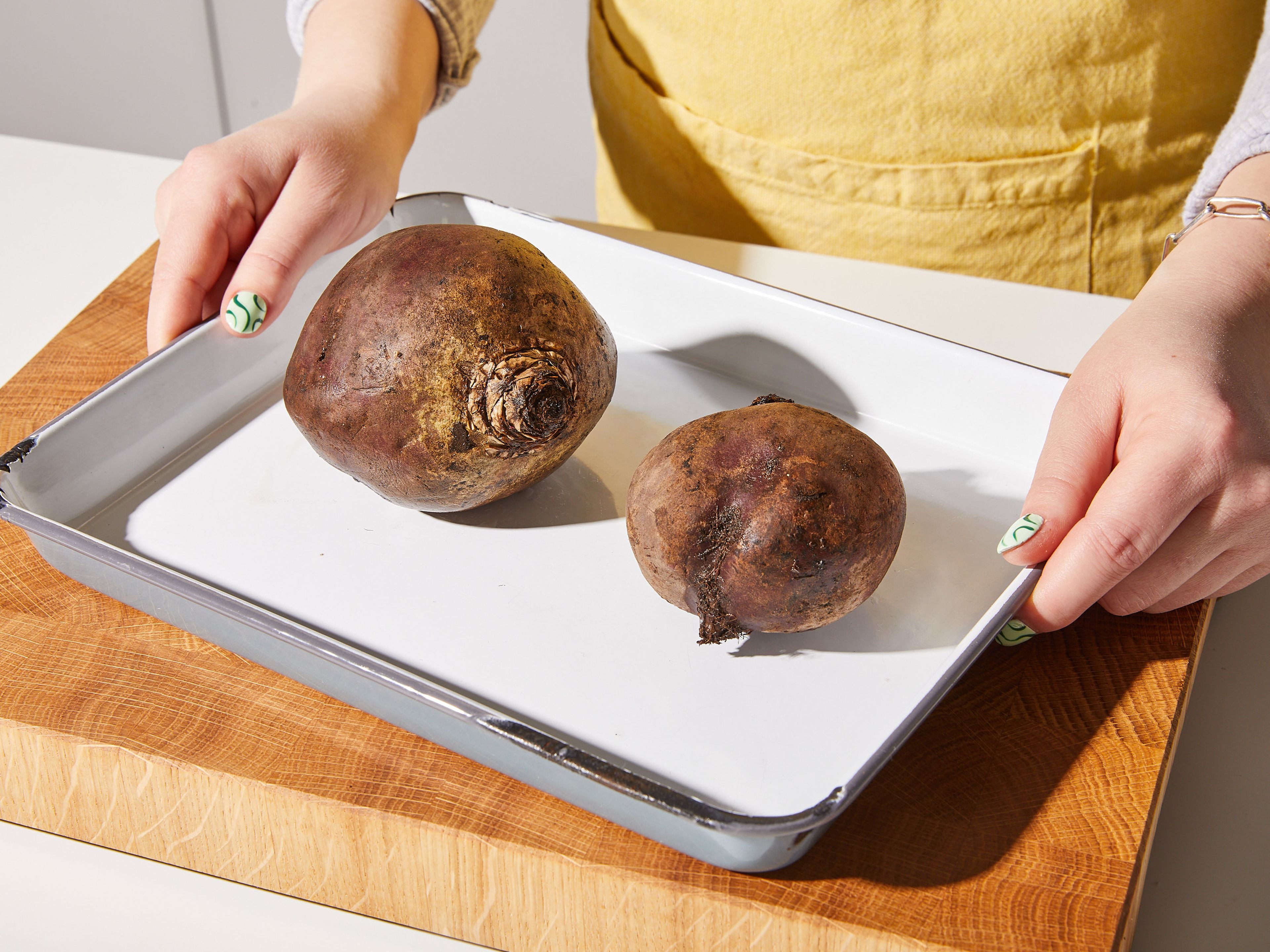 Preheat oven to 200°C/390°F. Place beet with skin on a baking tray, transfer to the oven and bake for approx. 40 min.