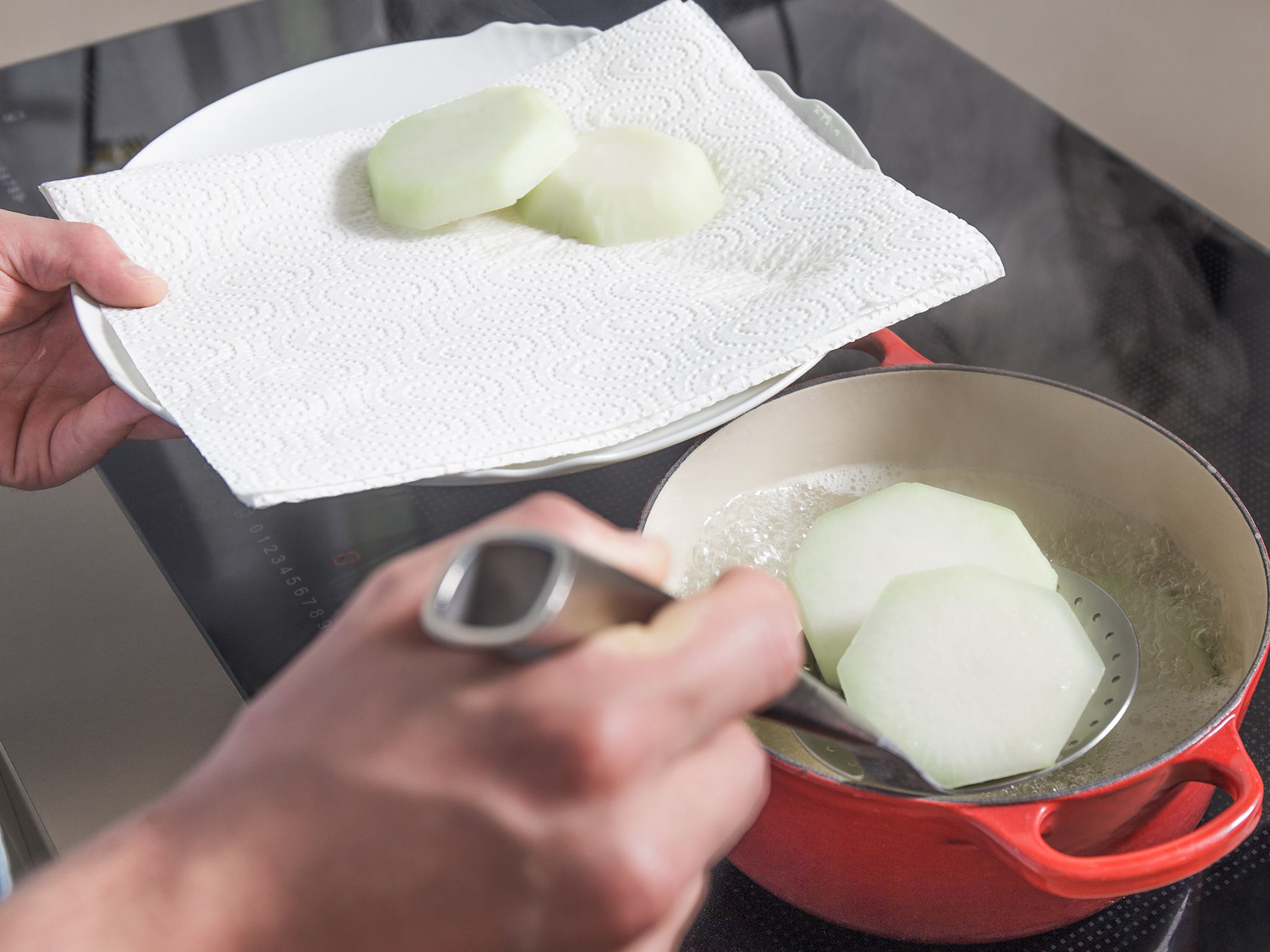 In a large pot of boiling water cook kohlrabi for approx. 5 – 6 min. Drain and transfer to a paper towel-lined plate to dry.