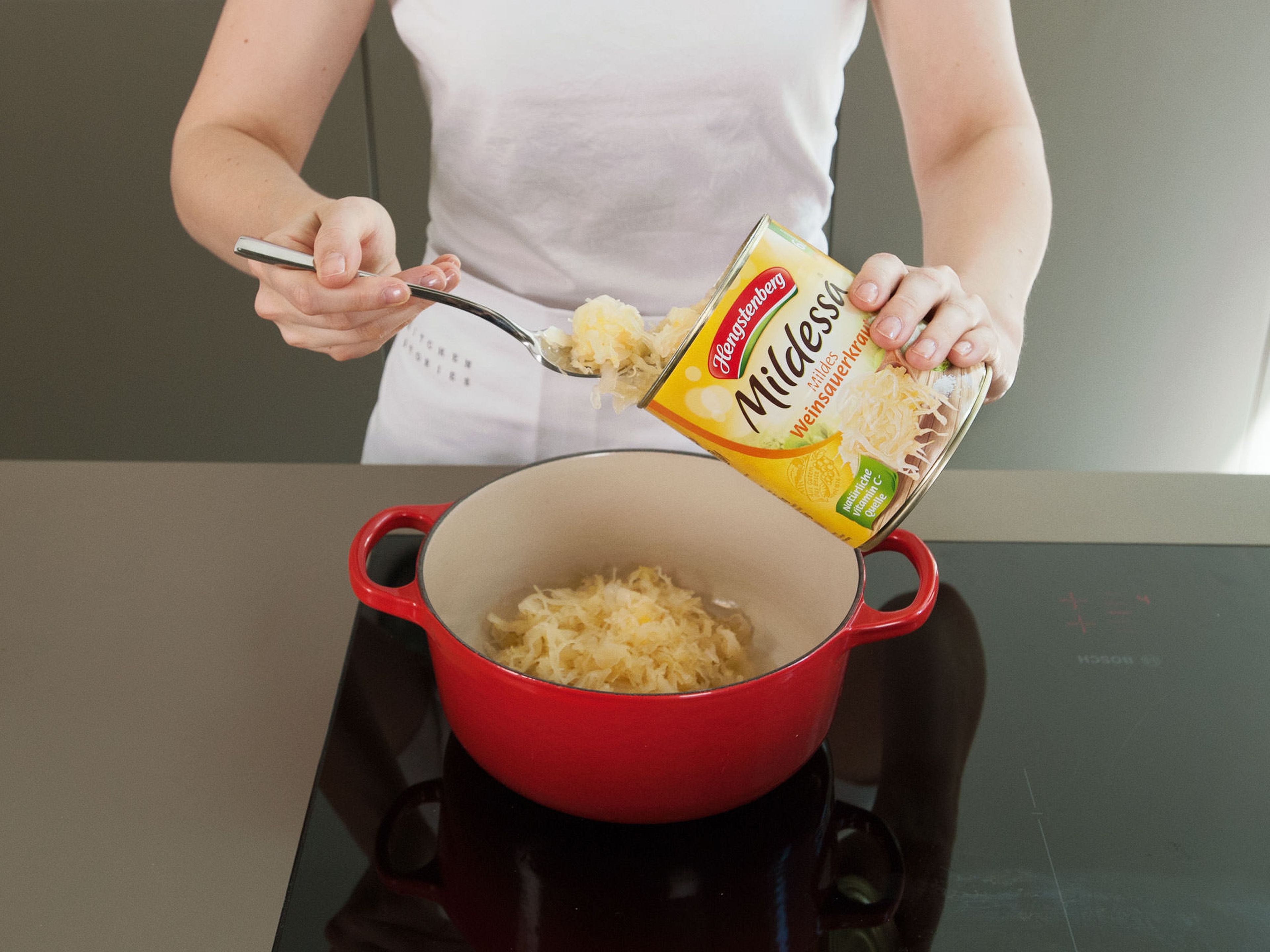 In a small saucepan, melt some of the butter over medium heat, add onion and bacon, and sauté for approx. 3 – 5 min. until bacon is crispy and onions are translucent. Add sauerkraut, stir thoroughly to combine, and cook for another 2 – 3 min.