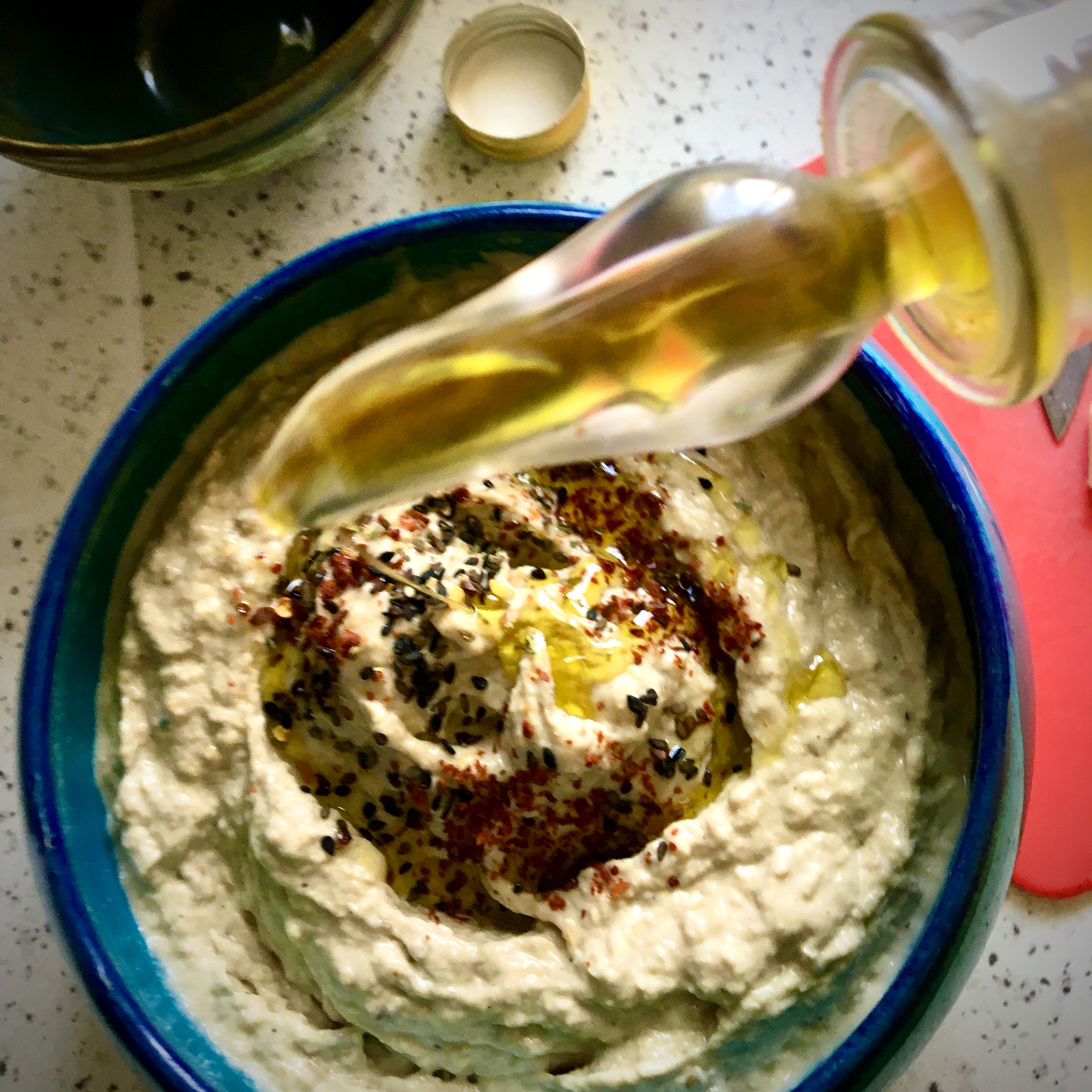Peel off the eggplant and discard the skin. Fluff the flesh with a fork in a bowl. It would result for about 1.5-2 cups of smoked eggplant. Add tahini, yogurt if using, garlic and lemon juice. Season with sea salt and freshly grated black pepper. Stir well, taste and adjust the seasoning.
