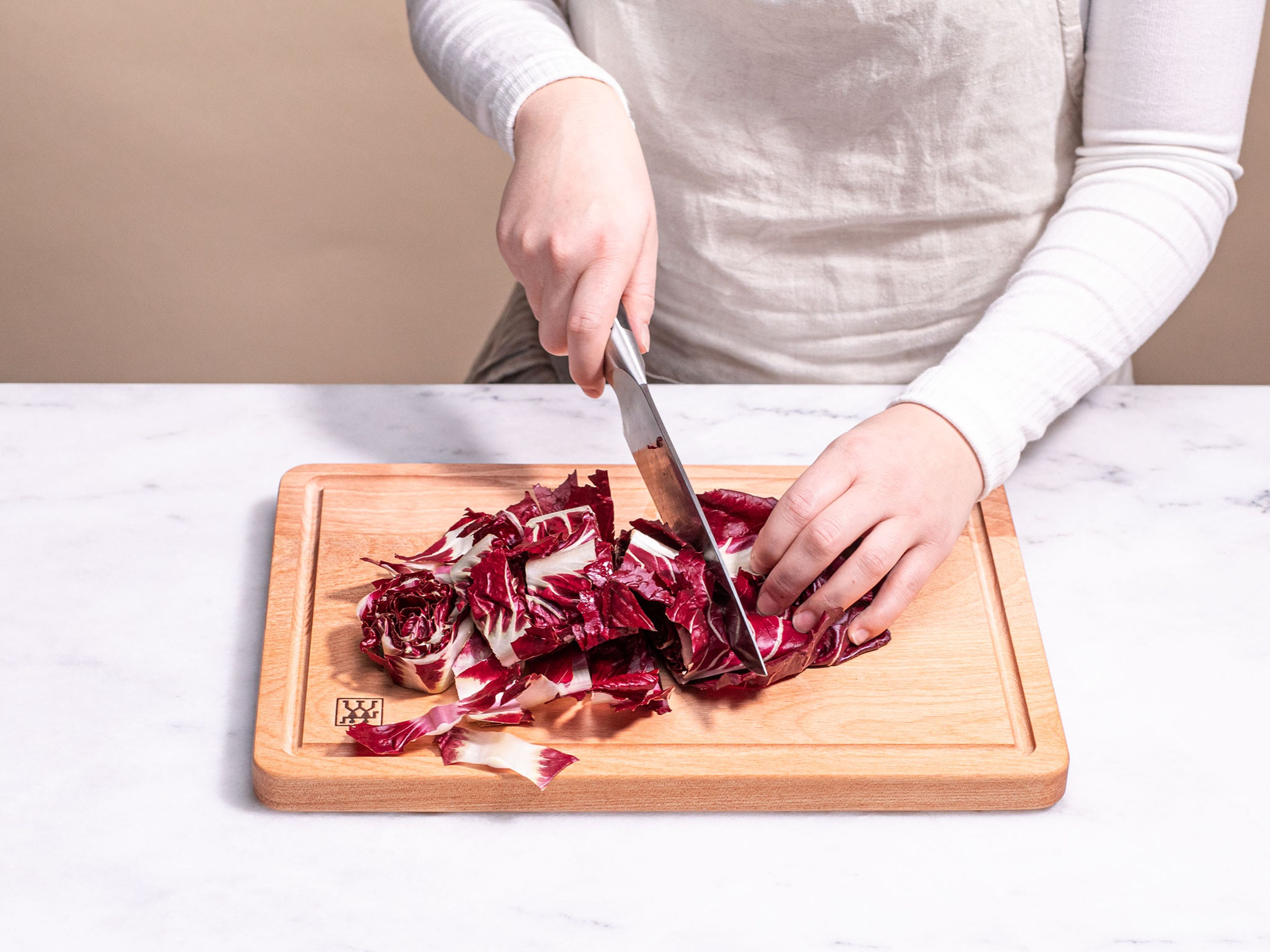 Thinly slice garlic clove. Chop radicchio into bite-sized pieces. Grate or finely slice Pecorino cheese. Remove leaves from thyme sprigs.