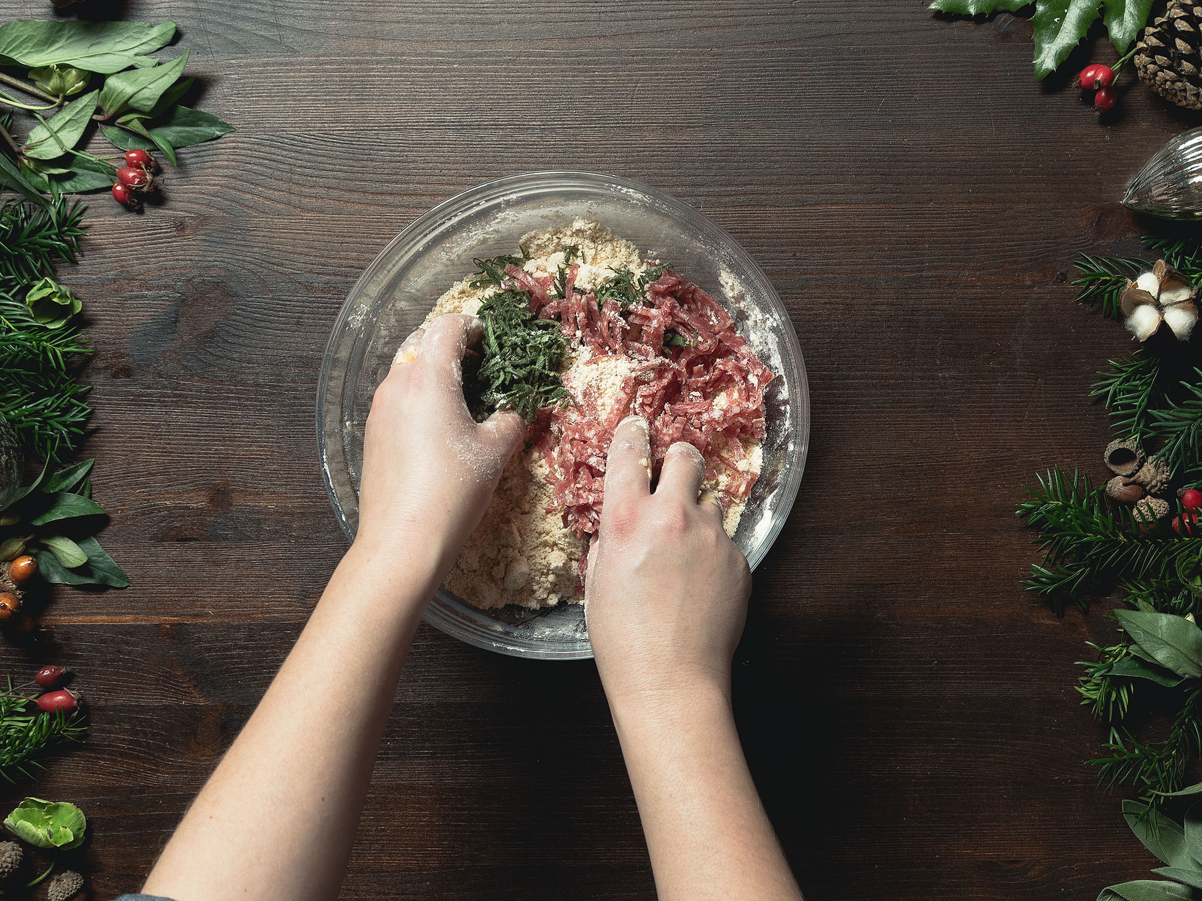 Mix flour, salt, baking powder, and smoked paprika powder in a mixing bowl. Mix butter into the flour mixture with your hands to form a crumbly dough. Add chopped salami and sage. Add buttermilk and knead everything together briefly.