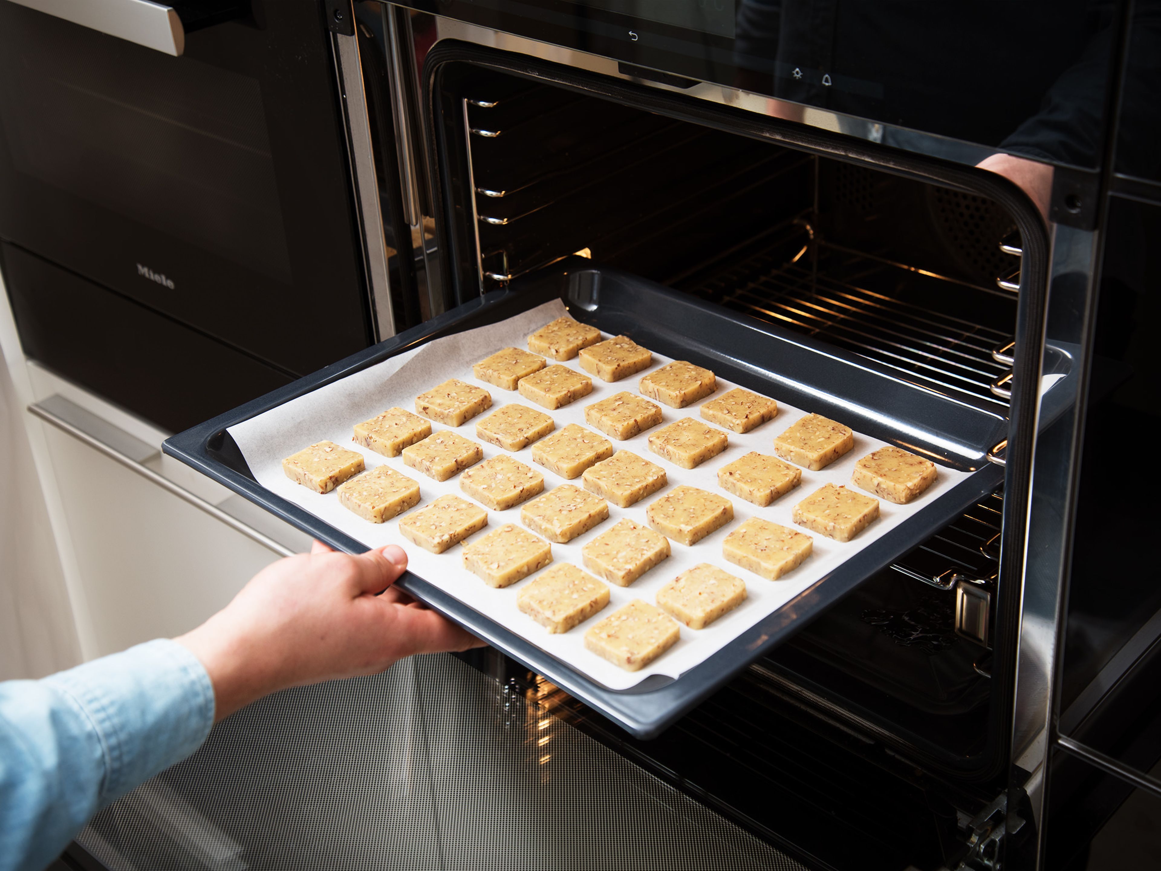 If the dough is too sticky to work with, freeze it briefly for approx. 6 – 8 min. Form a log and cut dough into desired shape, then place the shortbread on a lined baking tray. Bake at 160°C/325°F for approx. 12 min. Rotate the sheet and bake for another  10 – 13 min. Take the shortbread out, let cool, and enjoy!