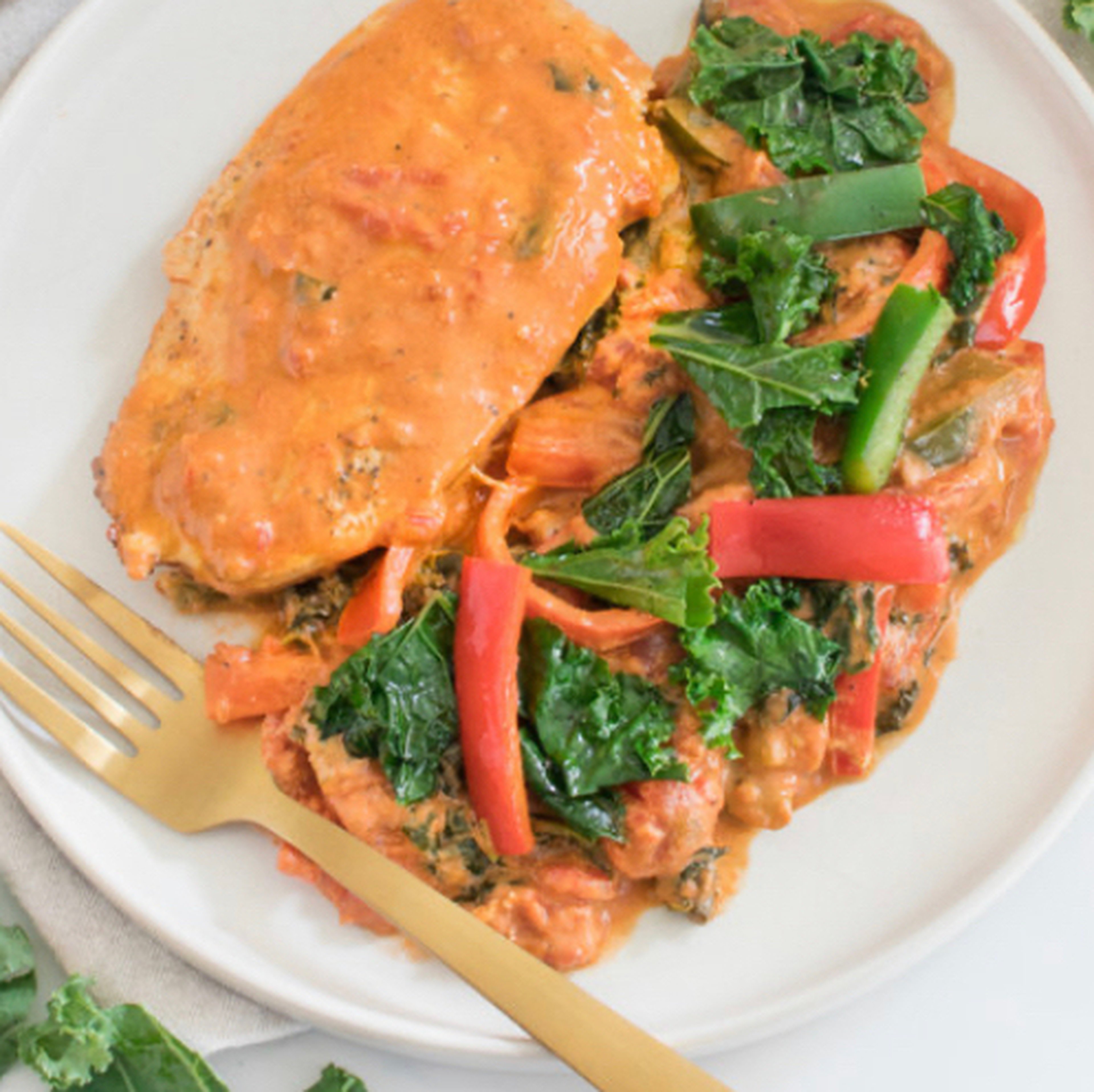 Creamy Cajun chicken with kale & bell peppers