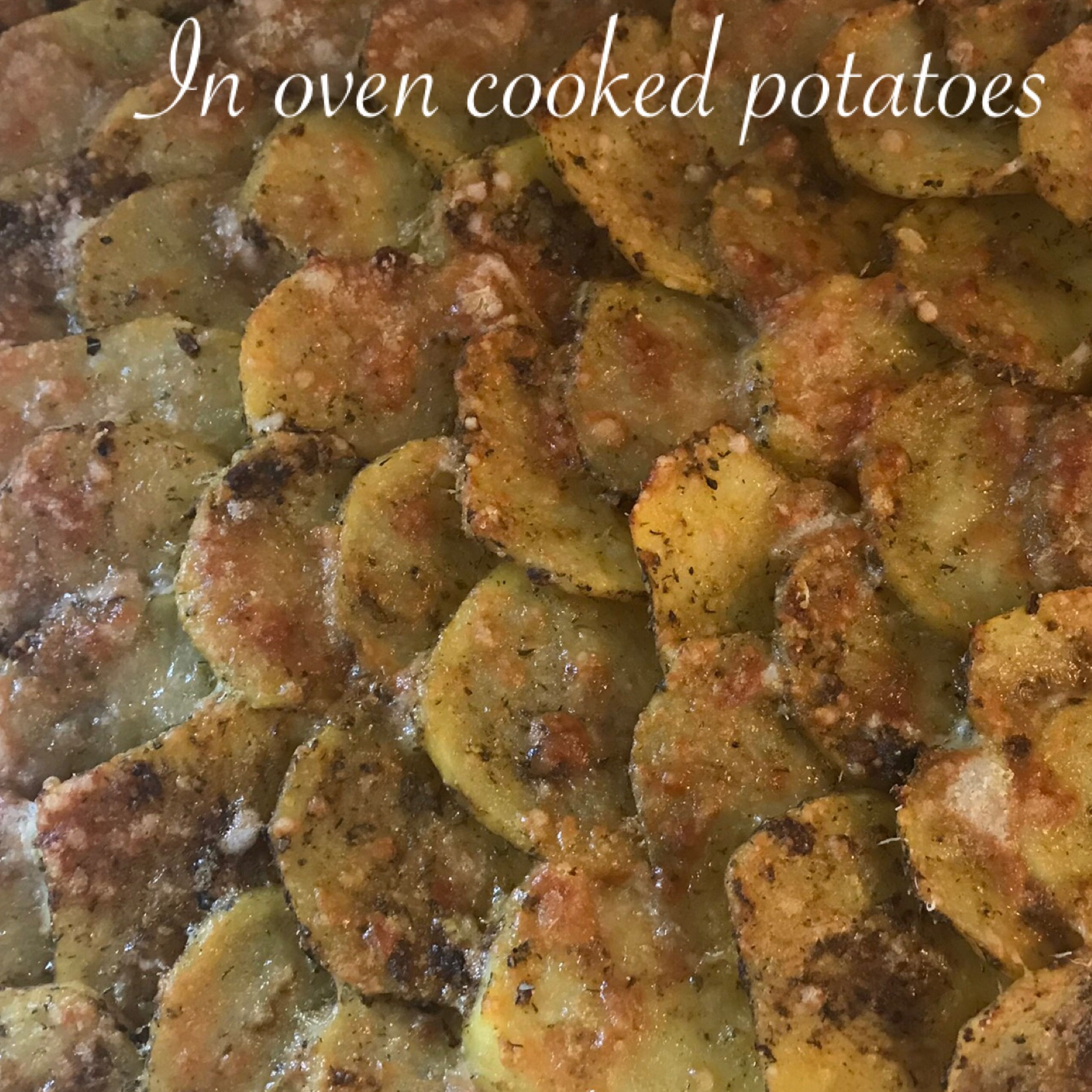 Slice potatoes in thin slices, add your favourite spices. Preheat oven to 200 temperature, take baking tray and nicely put all potatoes slices, make it like carpet without holes, on top add Parmesan cheese and put in oven for 15-20min.