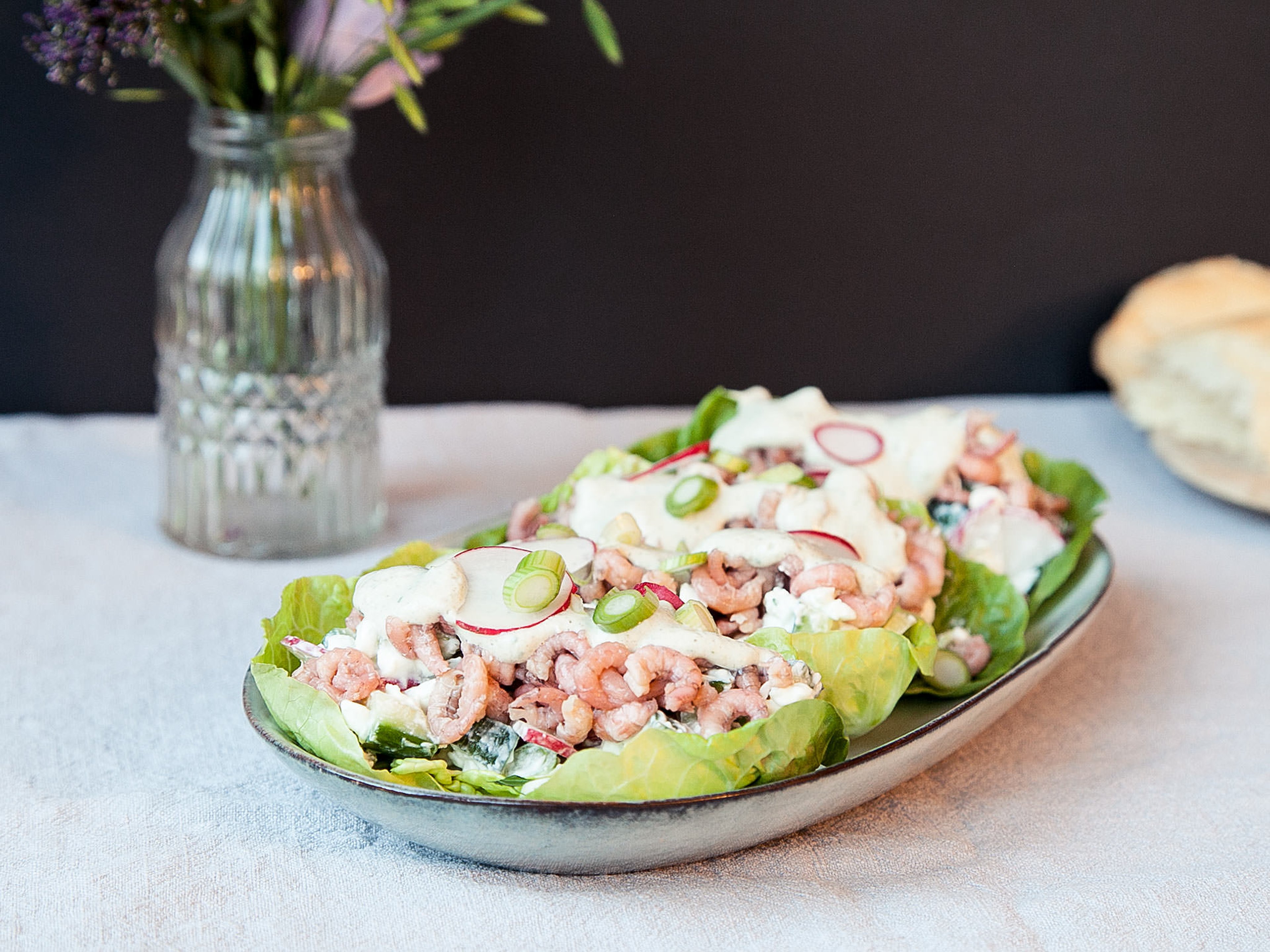 Shrimp-stuffed lettuce wraps with yogurt sauce