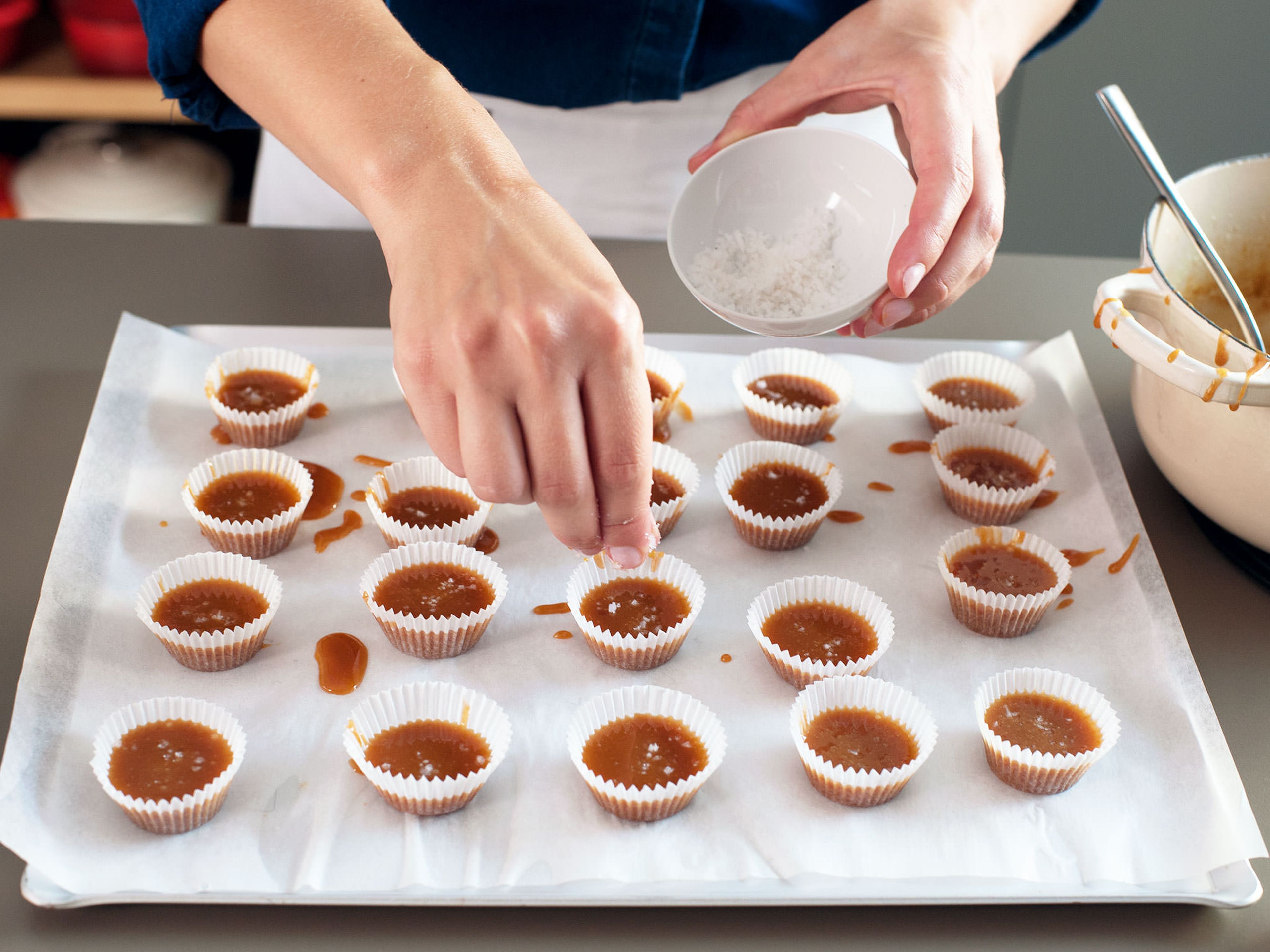 Spoon caramel into wrappers, sprinkle with flaky salt, and set aside to cool completely. Transfer caramels to an airtight container and store in the refrigerator until ready to serve.