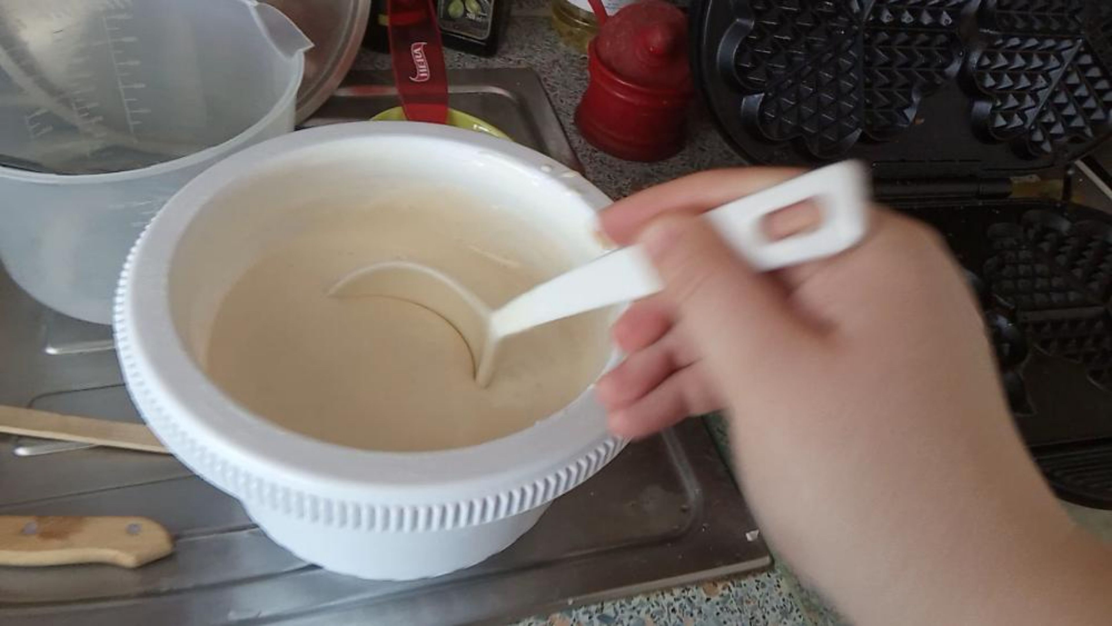 Pour the dough into a waffle maker.