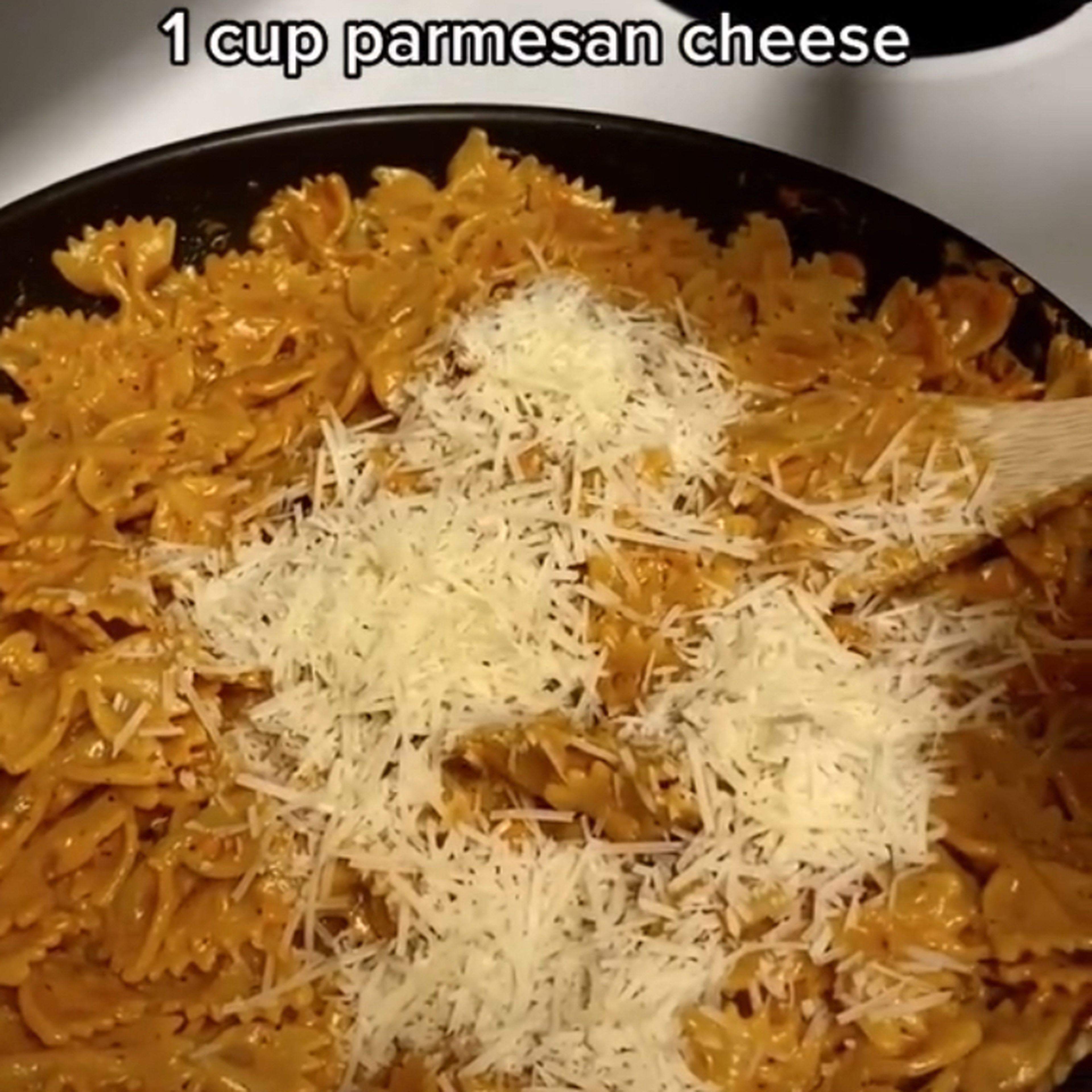 On top, put the parmesan cheese. And mix.