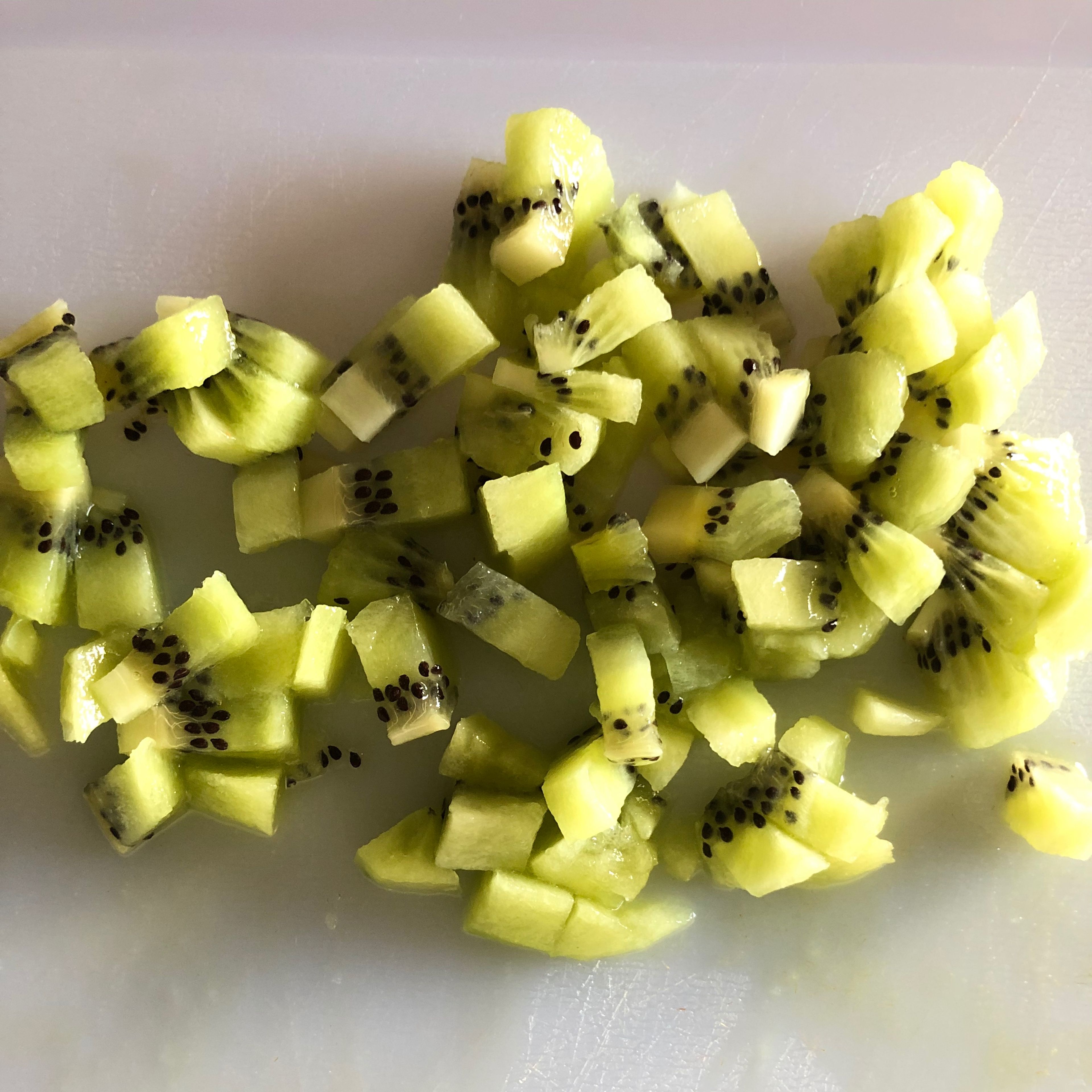 Cut the kiwi in smaller slices (like in the photo)