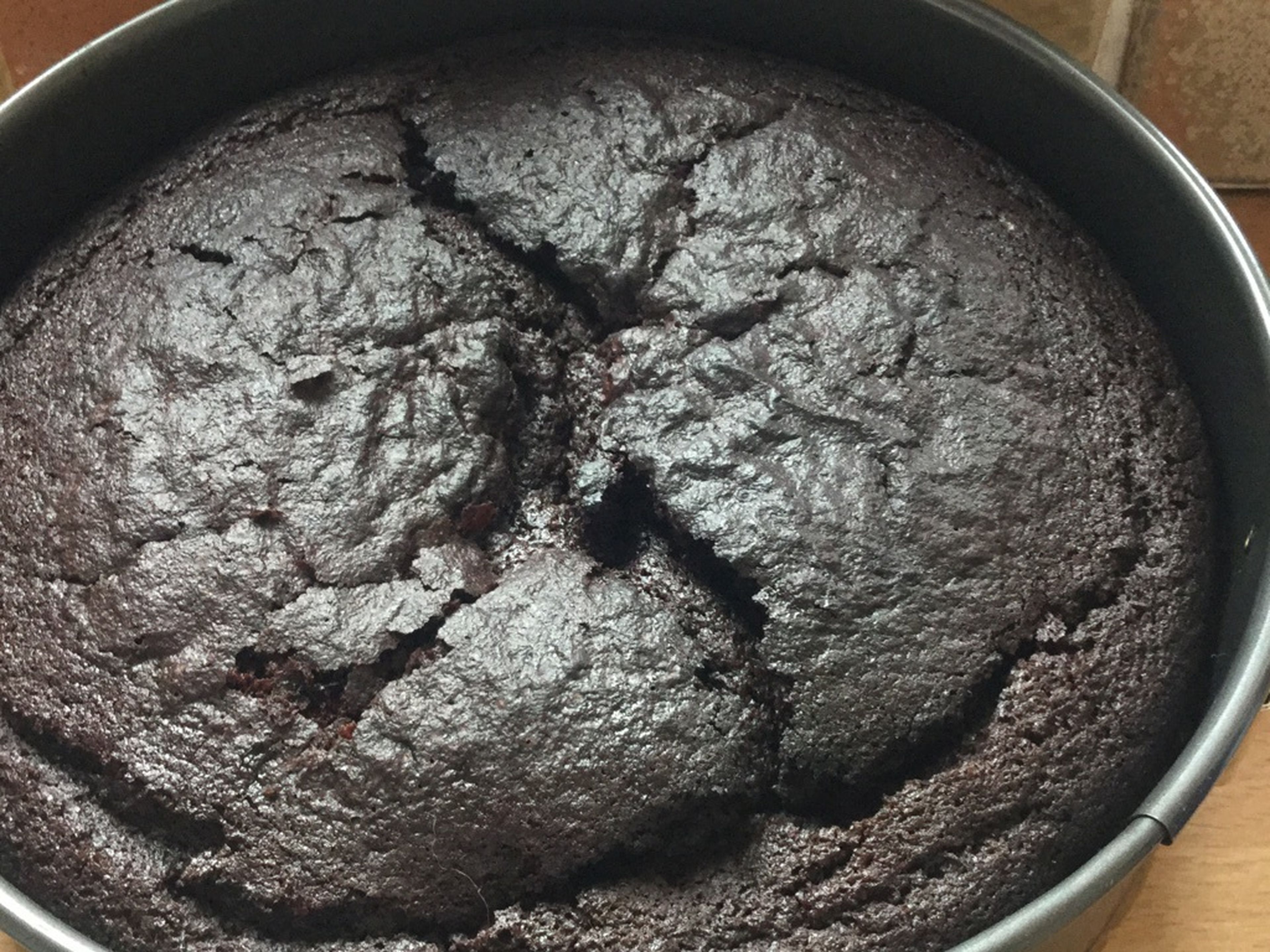 Ensure the cake is cooled (approx. 2 hrs.) before it is removed from the pan and iced.
