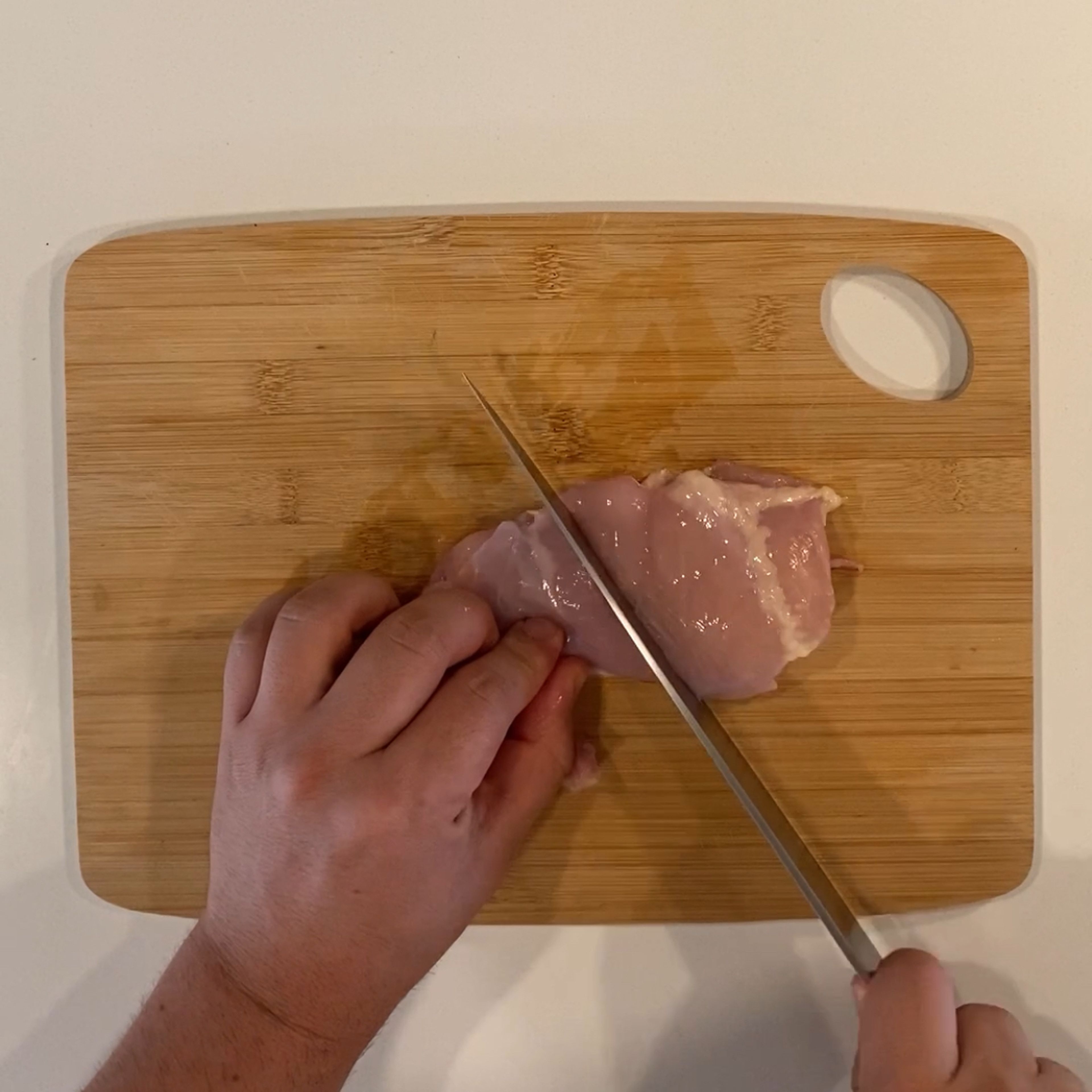 Cut the chicken thighs into size you like