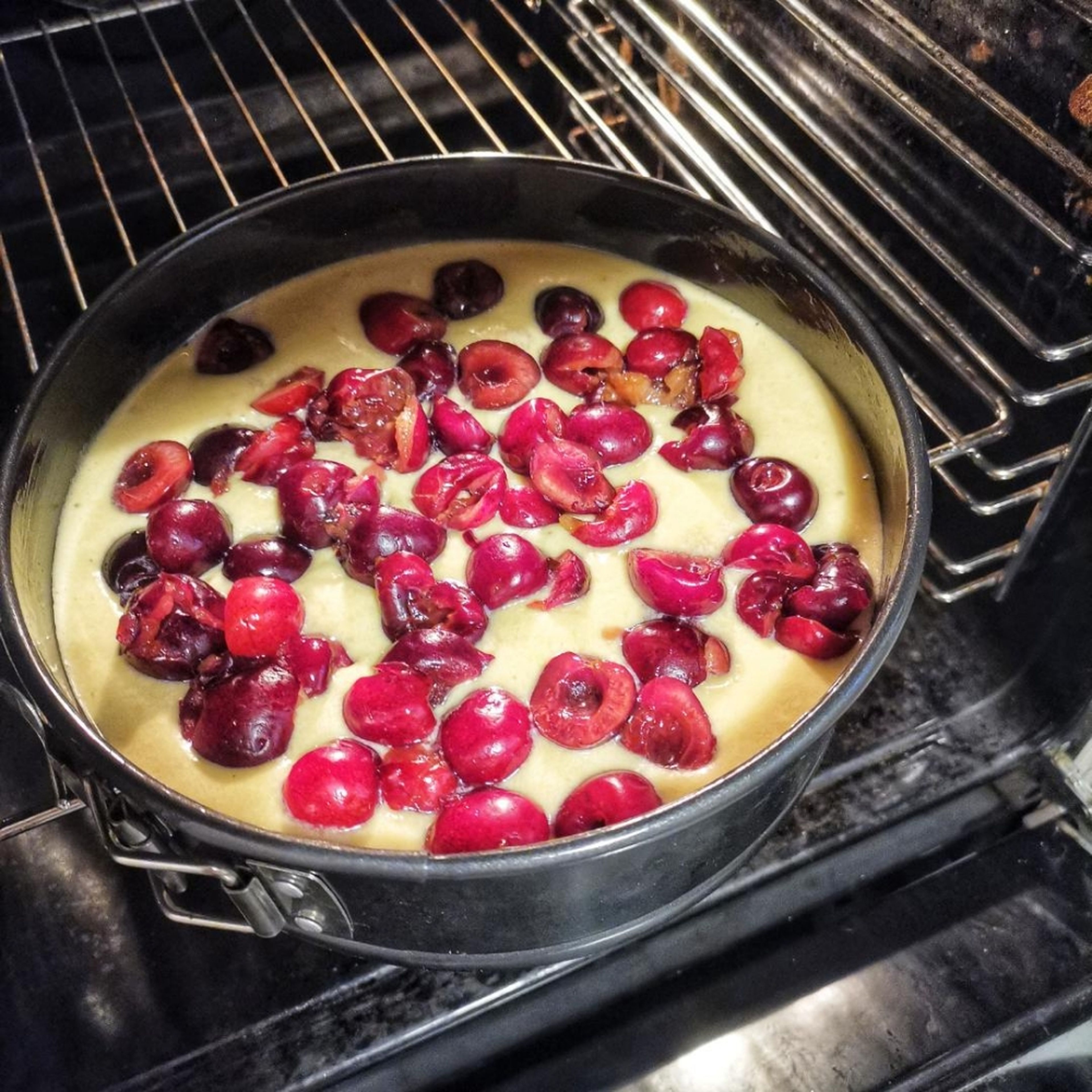 add cherries before you put a 20 cm pan in the oven.