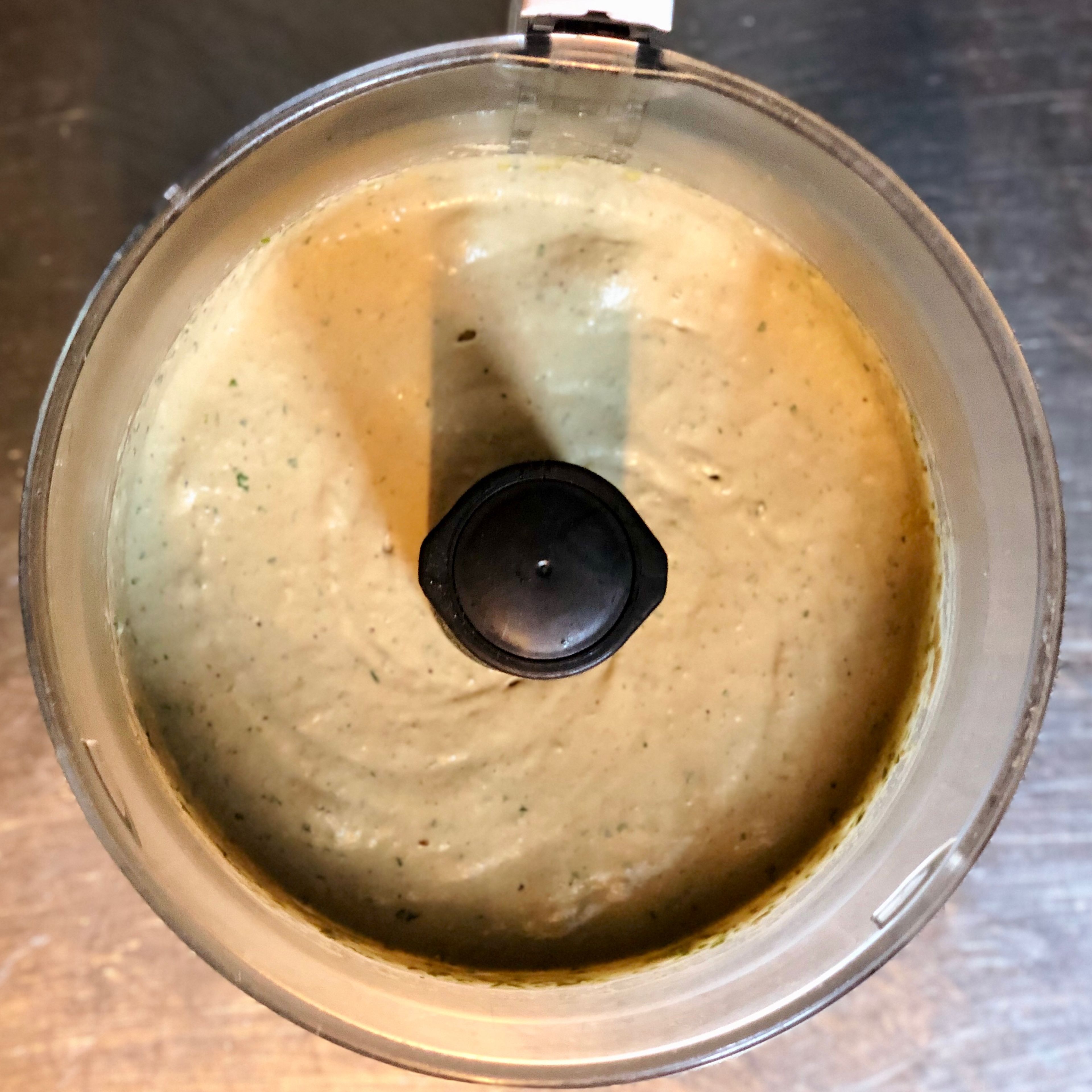 Place the flesh of the eggplants in a food processor or blender. Add lemon juice, tahini, garlic cloves , olive oil, pomegranate molasses, parsley, salt and pepper . Blend for 1-2 minutes until the mixture is smooth and creamy. Garnish with parsley olive oil and pomegranate seeds. Enjoy!