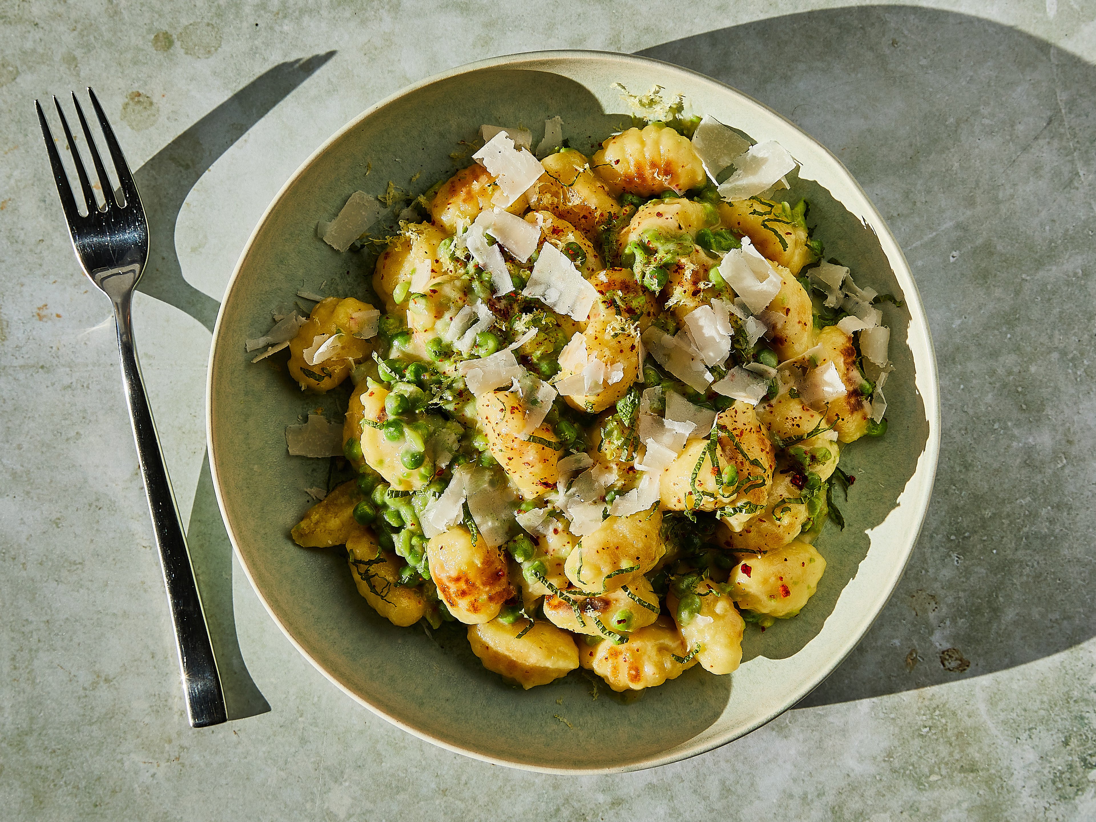 bacon fat crispy potatoes with garlicky kale and lemon-mint crème