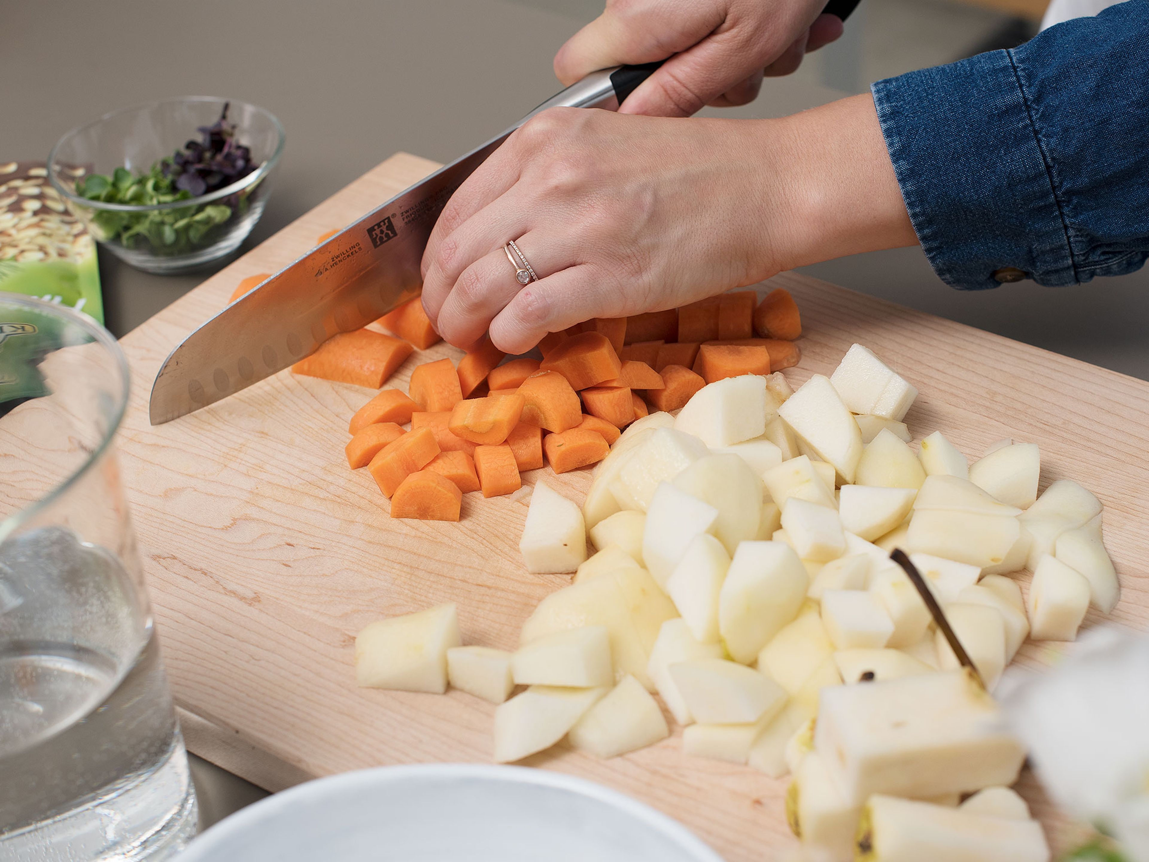 Peel, core, and cut pears into small chunks. Peel and cut carrots into bite-sized pieces.