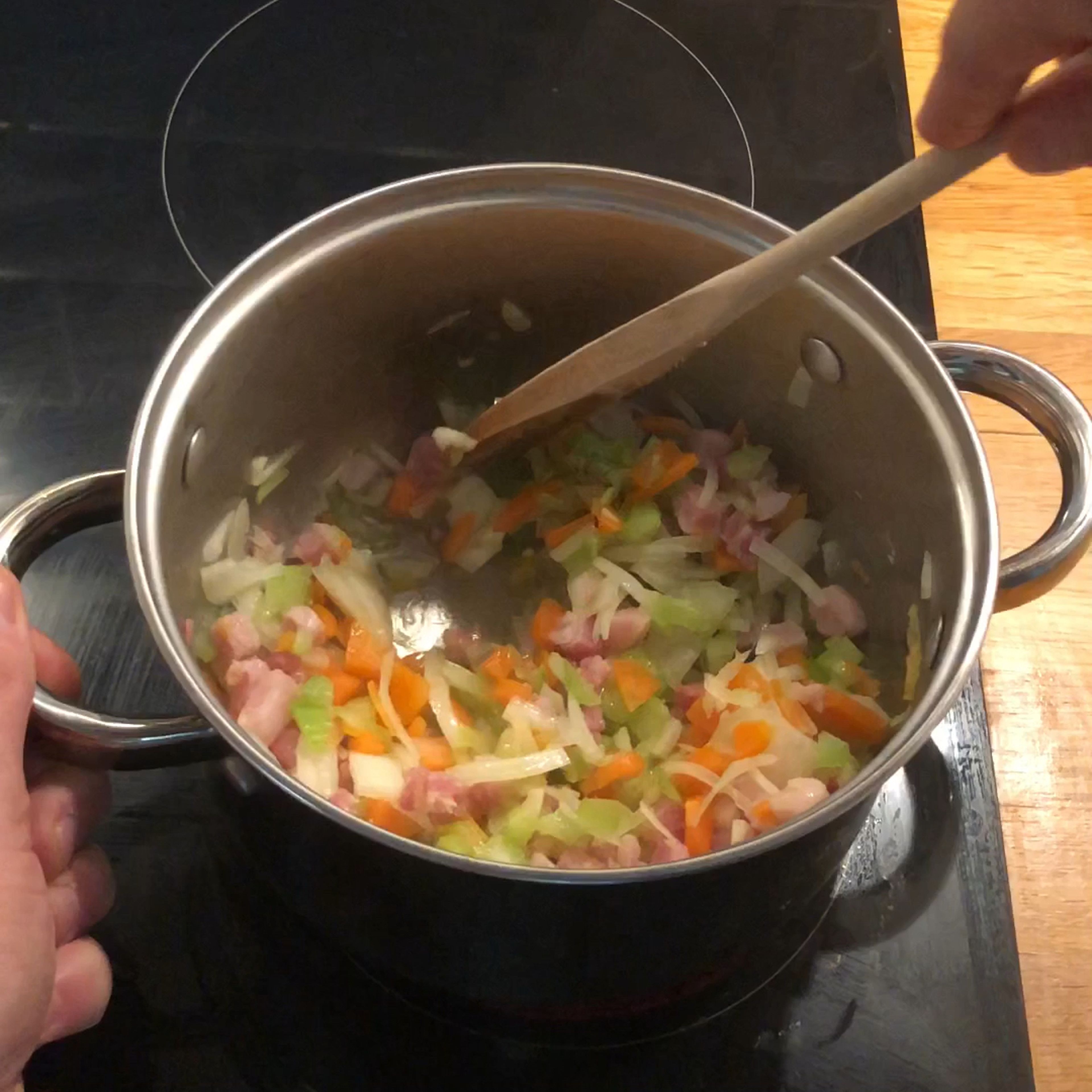 Put a few spoons of extra-virgin olive oil in a tall pot, with the soffritto and the pancetta. Stir and let it cook at low heat – at least 10 minutes – with continuous stiring so it doesn’t burn, until lucid