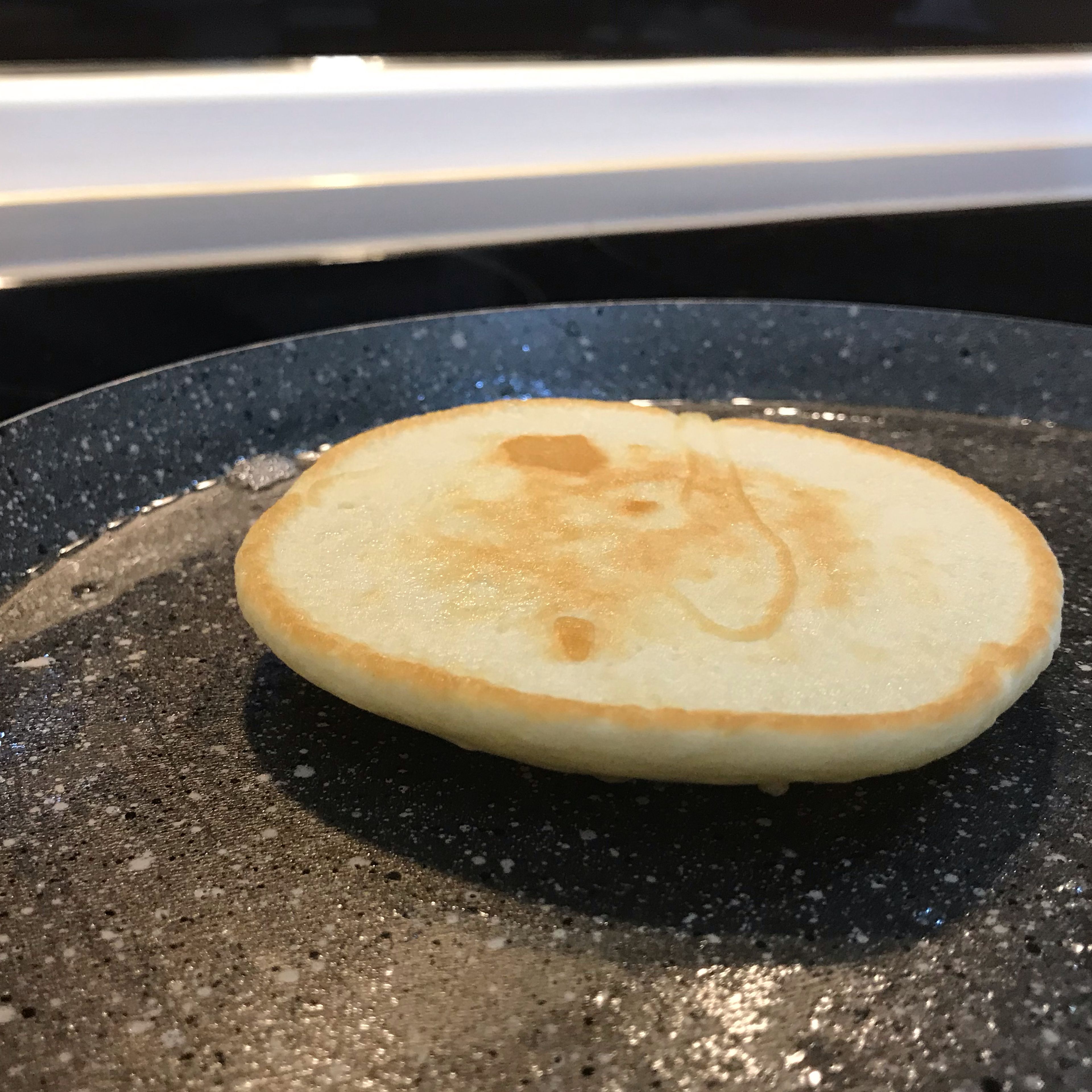 The pancakes should look like the picture at the end. You can put whatever you want, such as honey, jam or salty ingredients such as sour cream or cheese. As you can see the pancake is very fluffy and delicious!