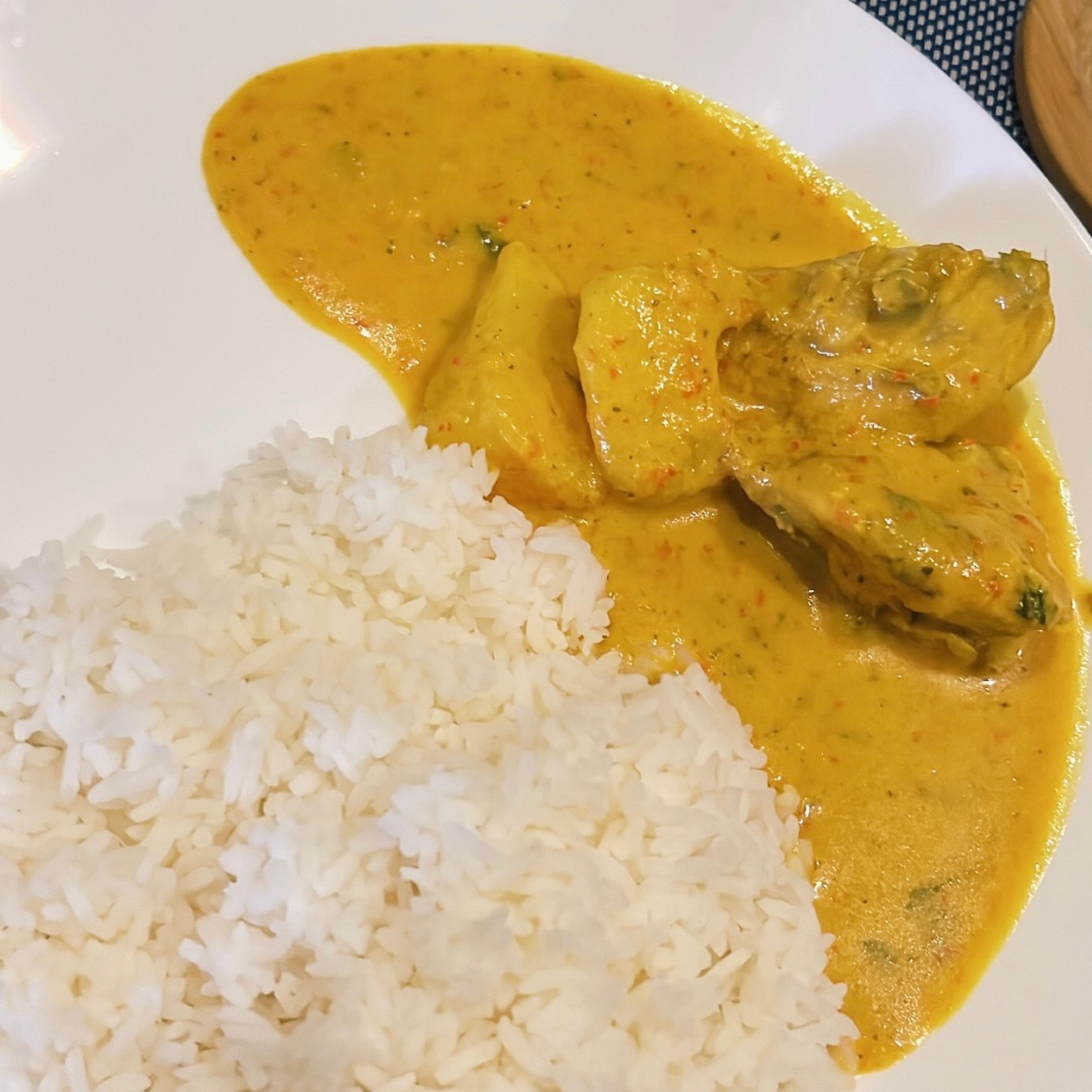 Chicken curry cooked in coconut cream with chilli padi