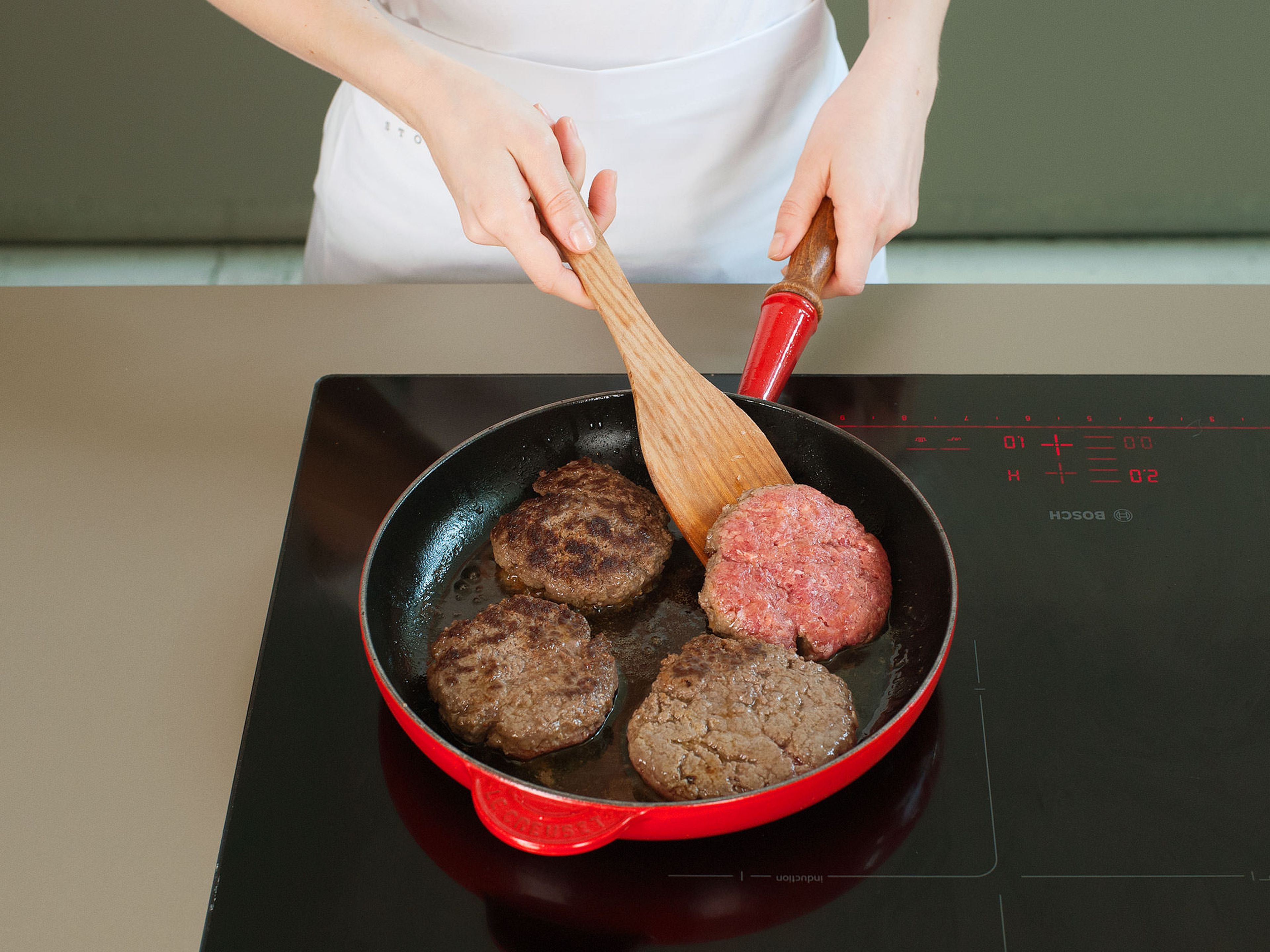 In a large frying pan, sauté burgers in some vegetable oil over medium heat for approx. 3 – 4 min. per side for medium-rare; 4 – 5 min. per side for well-done.