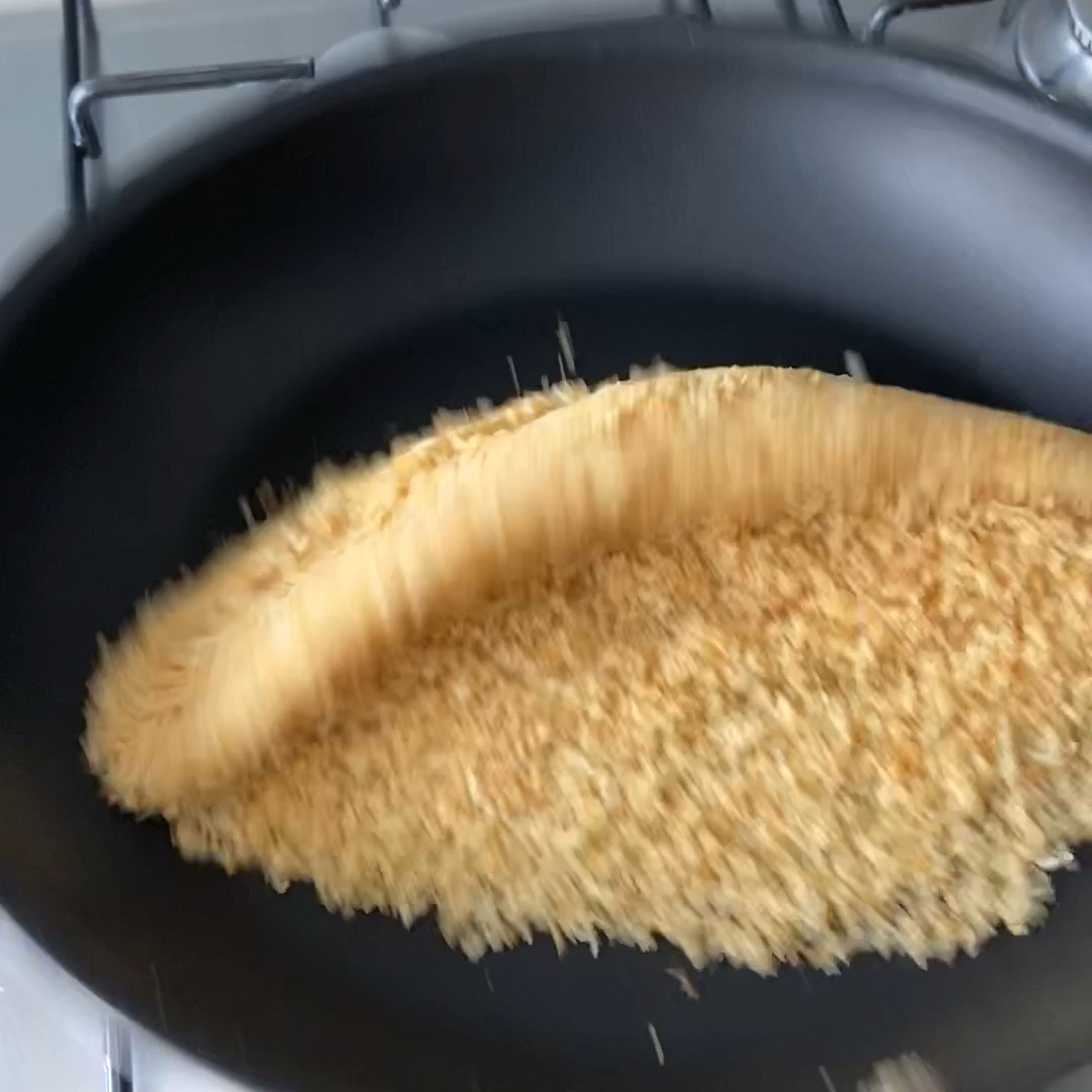 Preheat the oven to 400 F or 200 C. Heat the olive oil in a non-stick frying pan over medium heat and add the panko breadcrumbs. ‘Fry’ the panko by stirring and moving the crumbs frequently so that they get evenly toasted. Be careful because they are slow to get color but then can burn very fast if you are not attentive. Turn off the heat and transfer to a shallow dish to cool down.