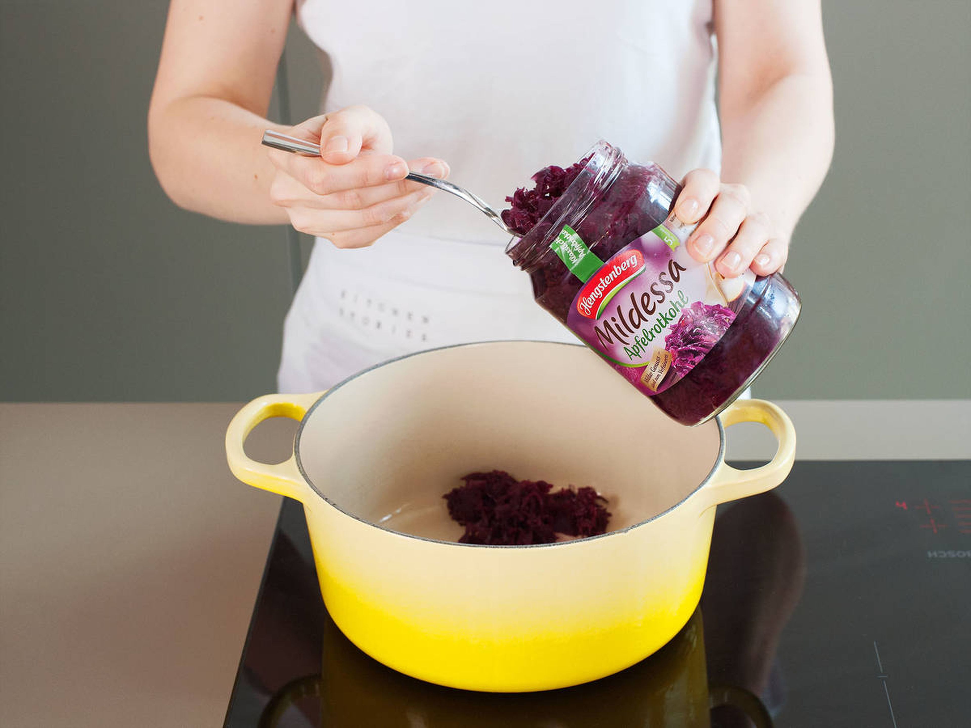 In a large saucepan, heat up some red cabbage over medium heat for approx. 8 – 10 min. Remove from heat, cover, and set aside.