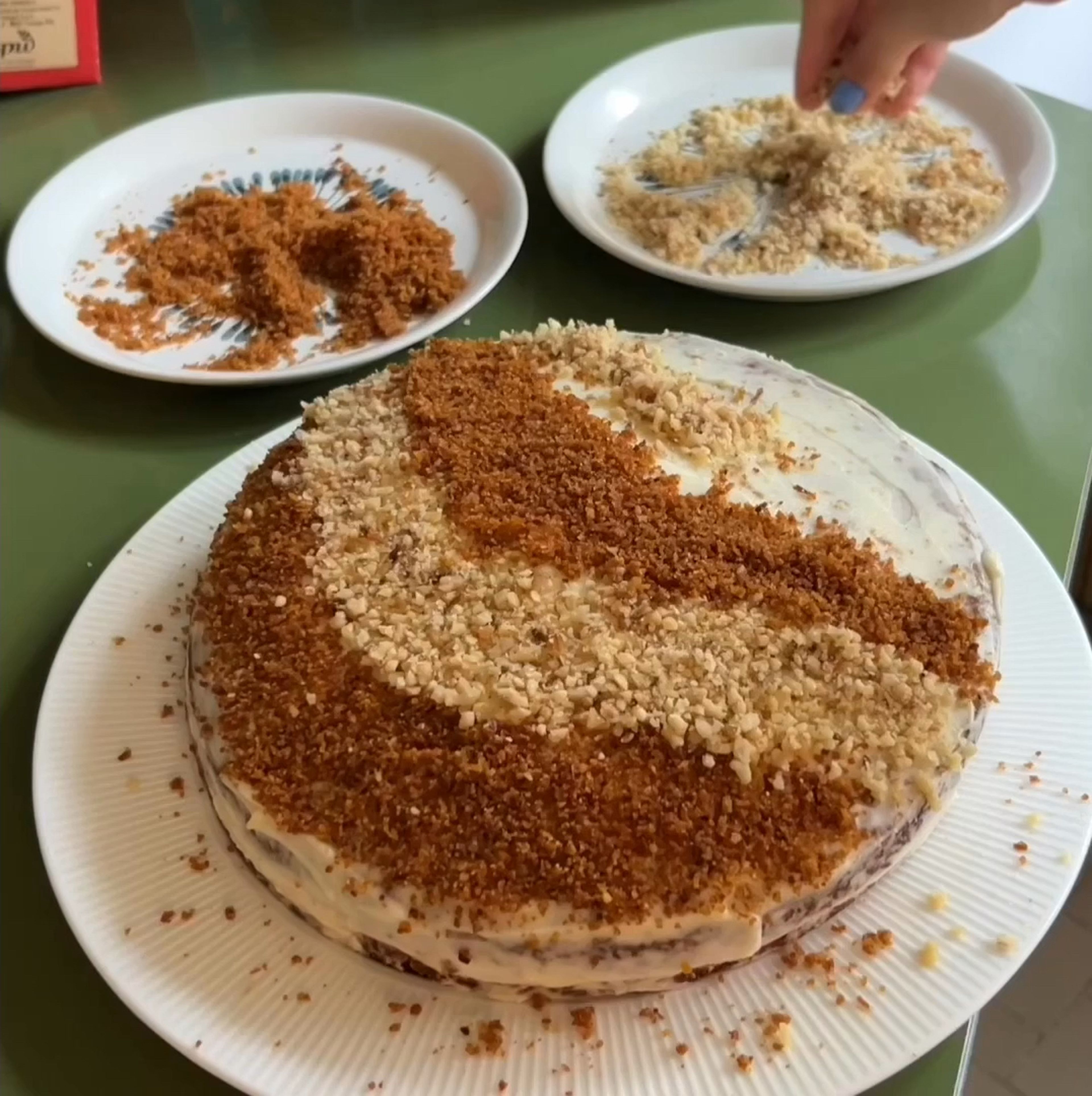 For decoration I used peeled dough pieces from the top of the cake which I ground in a blender and some ground walnuts as well. Then use your imagination and decorate your Carrot Cake. When it’s done, put it in the fridge to chill for a couple of hours. 